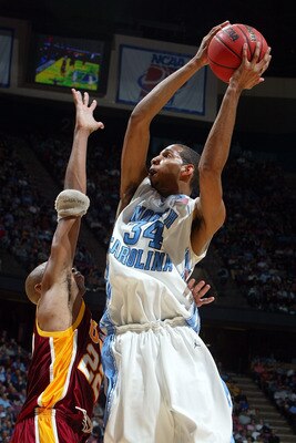 EAST RUTHERFORD, NJ - MARCH 23:  Brandan Wright #34 of the University of North Carolina Tar Heels goes to the hoop against Taj Gibson #22 of the University of Southern California Trojans during the NCAA Men's East Regional Semifinal at Continental Airline