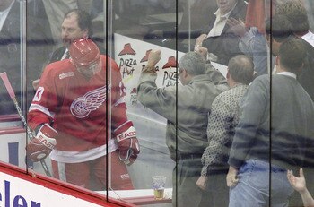 27 Apr 2000:  Colorado Avalanche fans pound on the glass to the penalty box as Vyacheslav Kozlov #13 of the Detroit Red Wings starts a penalty during the first period in Game 1 of the Western Conference Semifinals at the Pepsi Center in Denver, Colorado. 