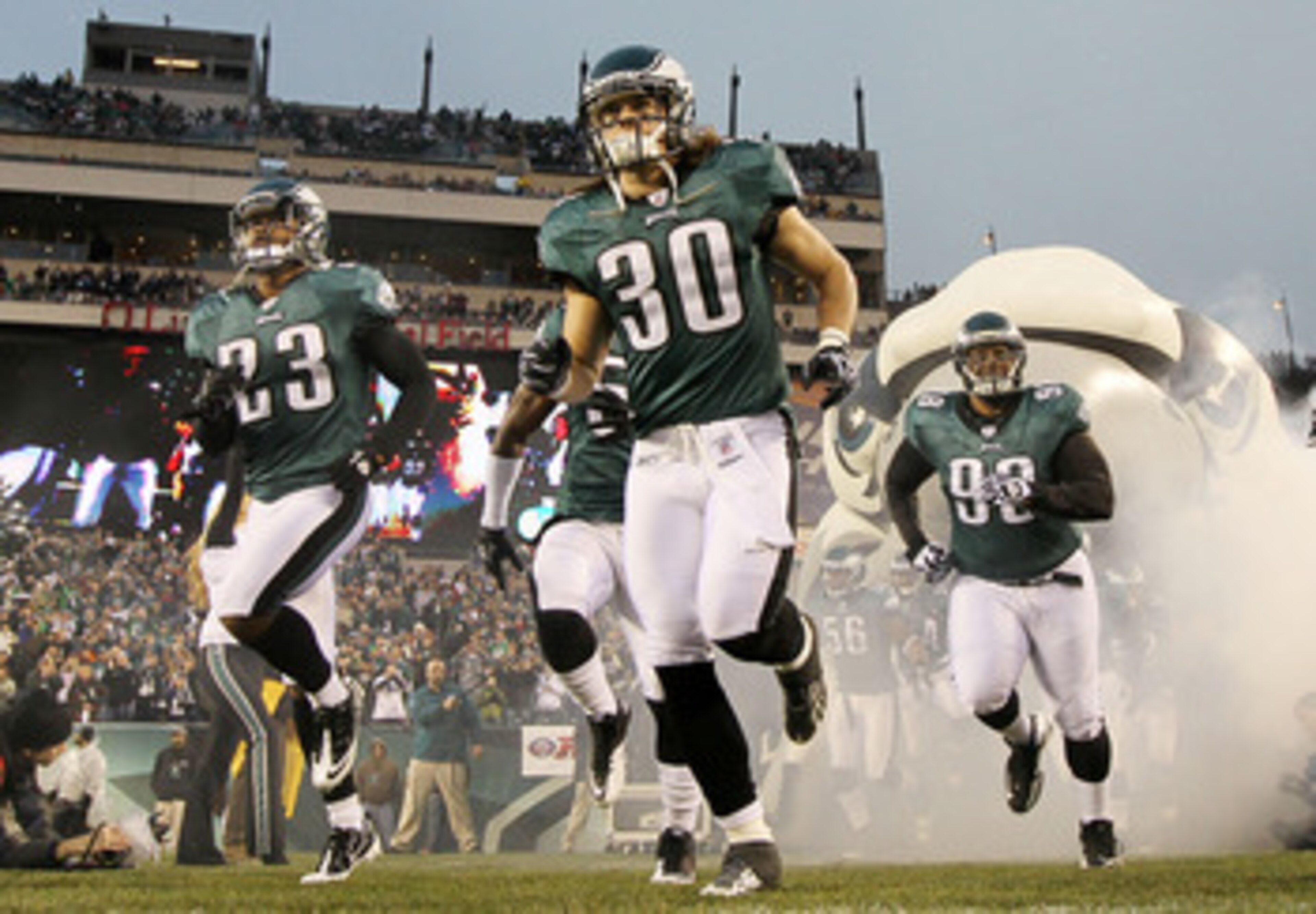 PHILADELPHIA, PA - JANUARY 02:  Dimitri Patterson #23, Colt Anderson #30, and Mike Patterson #98 of the Philadelphia Eagles take the field to play against the Dallas Cowboys on January 2, 2011 at Lincoln Financial Field in Philadelphia, Pennsylvania.  (Ph