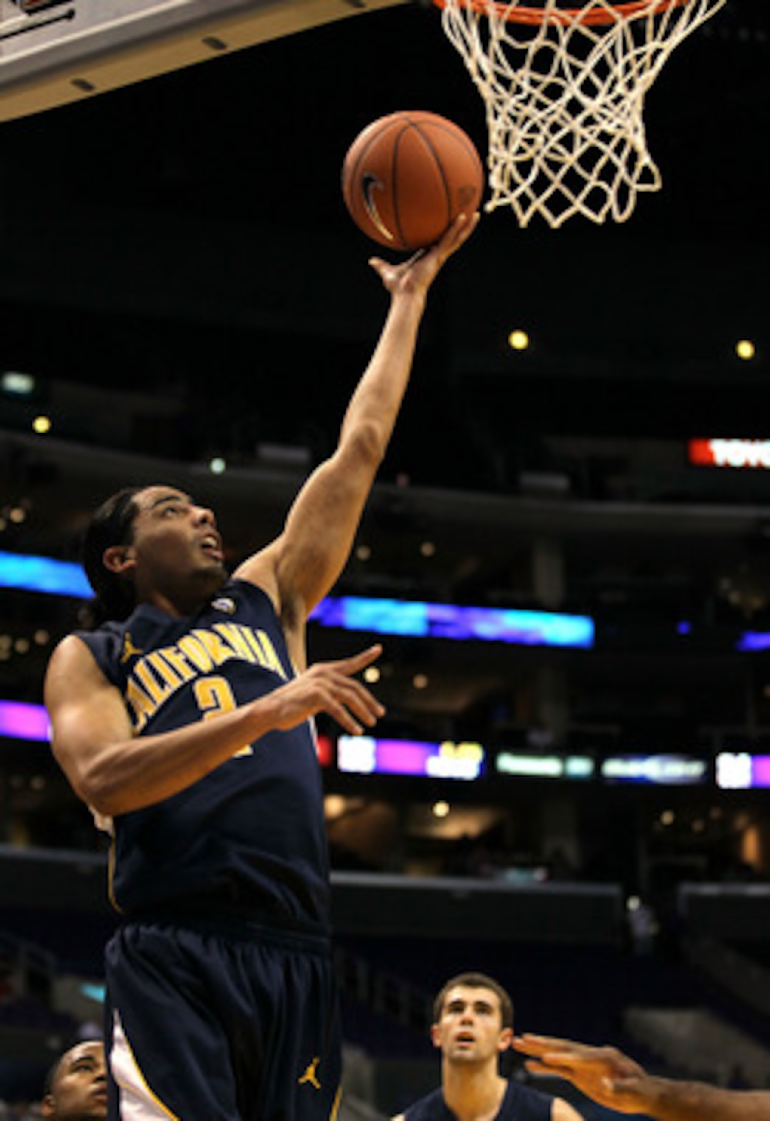 LOS ANGELES, CA - MARCH 10:  Jorge Gutierrez #2 of the California Golden Bears lays the ball up in the first half against the USC Trojans in the quarterfinals of the 2011 Pacific Life Pac-10 Men's Basketball Tournament at Staples Center on March 10, 2011 