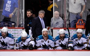 VANCOUVER, CANADA - MAY 18:  Head Coach Todd McLellan of the San Jose Sharks looks on from the bench area during Game Two of the Western Conference Finals against the Vancouver Canucks during the 2011 Stanley Cup Playoffs at Rogers Arena on May 18, 2011 i