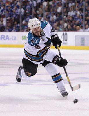 VANCOUVER, CANADA - MAY 24:  Ian White #9 of the San Jose Sharks shoots the puck in Game Five of the Western Conference Finals against the Vancouver Canucks during the 2011 Stanley Cup Playoffs at Rogers Arena on May 24, 2011 in Vancouver, British Columbi