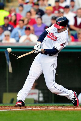 CLEVELAND, OH - JUNE 3: Grady Sizemore #24 of the Cleveland Indians hits an infield single during the second inning against the Texas Rangers at Progressive Field on June 3, 2011 in Cleveland, Ohio.  (Photo by Jason Miller/Getty Images)