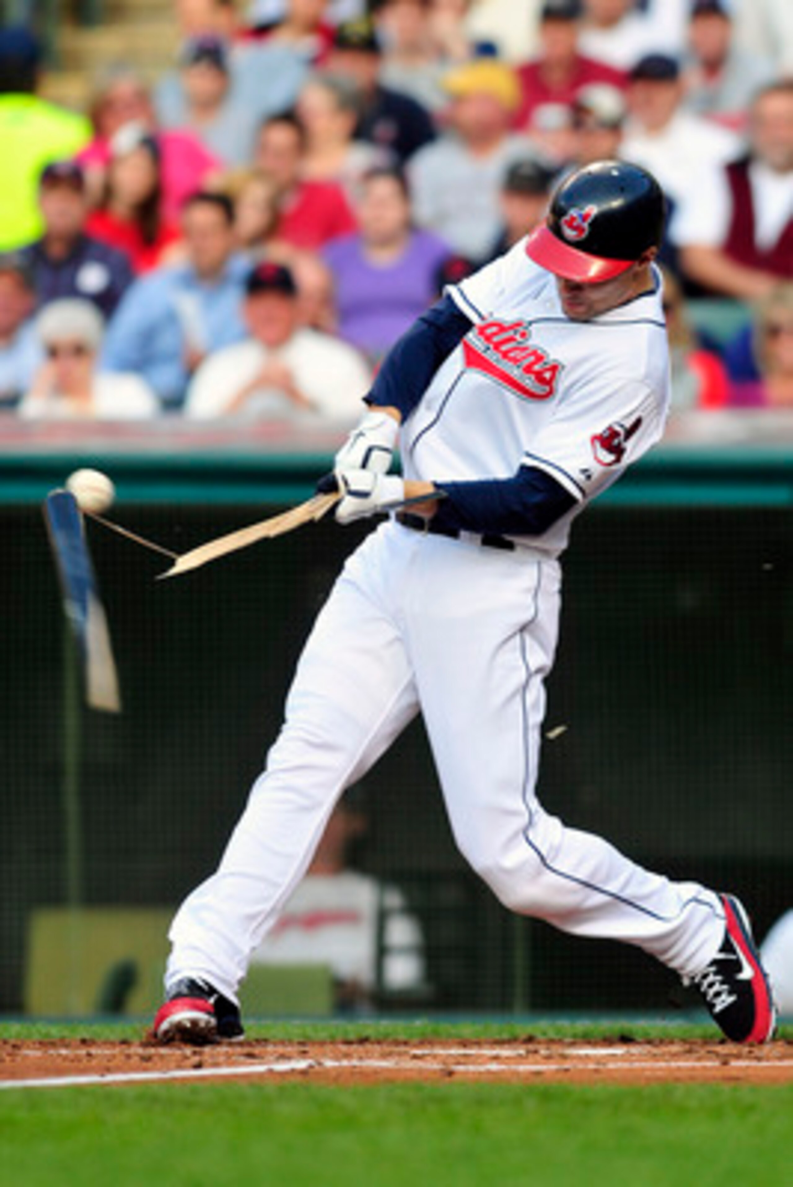 CLEVELAND, OH - JUNE 3: Grady Sizemore #24 of the Cleveland Indians hits an infield single during the second inning against the Texas Rangers at Progressive Field on June 3, 2011 in Cleveland, Ohio.  (Photo by Jason Miller/Getty Images)