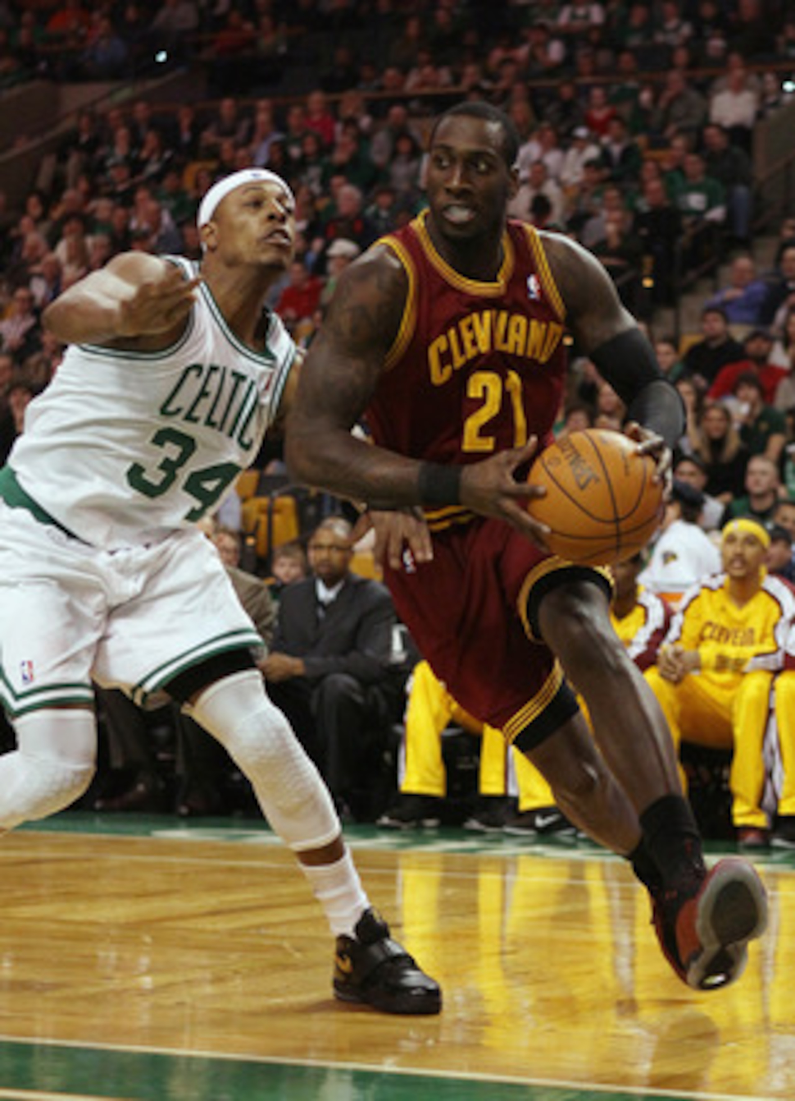 BOSTON, MA - JANUARY 25:  J.J. Hickson #21 of the of the Cleveland Cavaliers heads for the net as Paul Pierce #34 of the Boston Celtics defends on January 25, 2011 at the TD Garden in Boston, Massachusetts.   NOTE TO USER: User expressly acknowledges and 