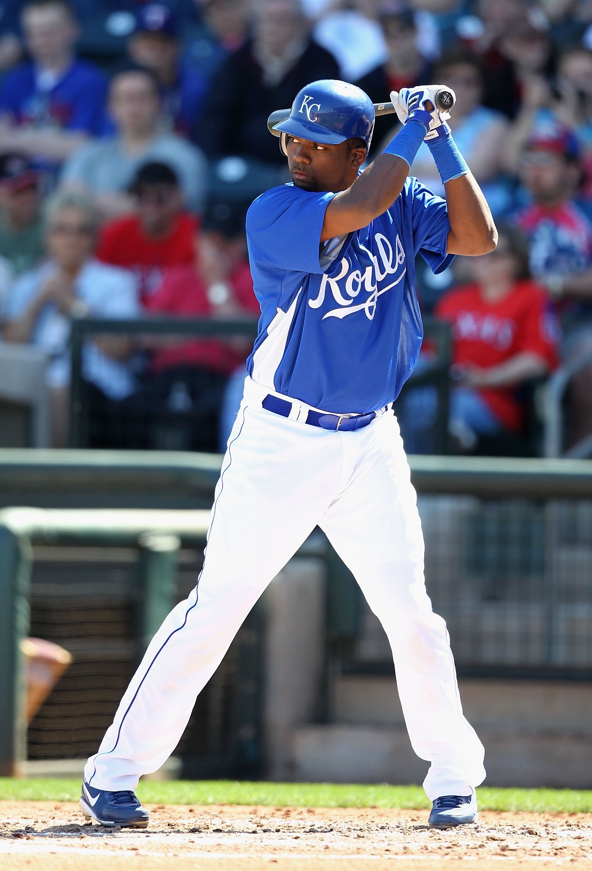 SURPRISE, AZ - MARCH 05:  Wilson Betemit #46 of the Kansas City Royals bats against the Texas Rangers during the MLB spring training game at Surprise Stadium on March 5, 2010 in Surprise, Arizona.  The Royals defeated the Rangers 4-2.  (Photo by Christian