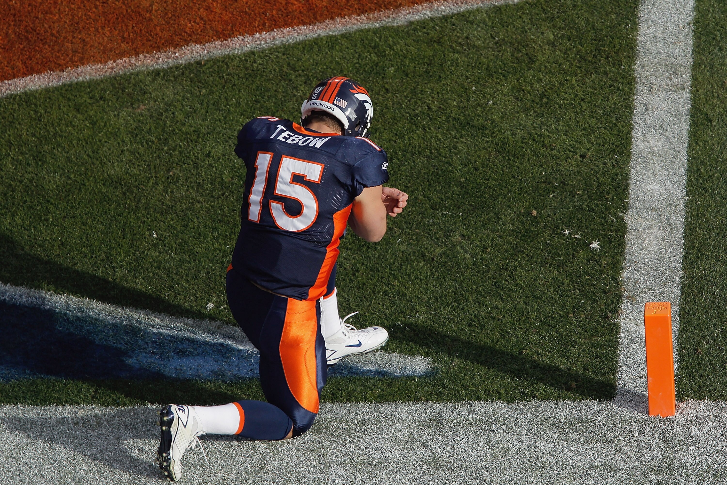 DENVER - DECEMBER 26:  Tim Tebow #15 of the Denver Broncos prays in the end zone prior to taking on the Houston Texans at INVESCO Field at Mile High on December 26, 2010 in Denver, Colorado. (Photo by Justin Edmonds/Getty Images)