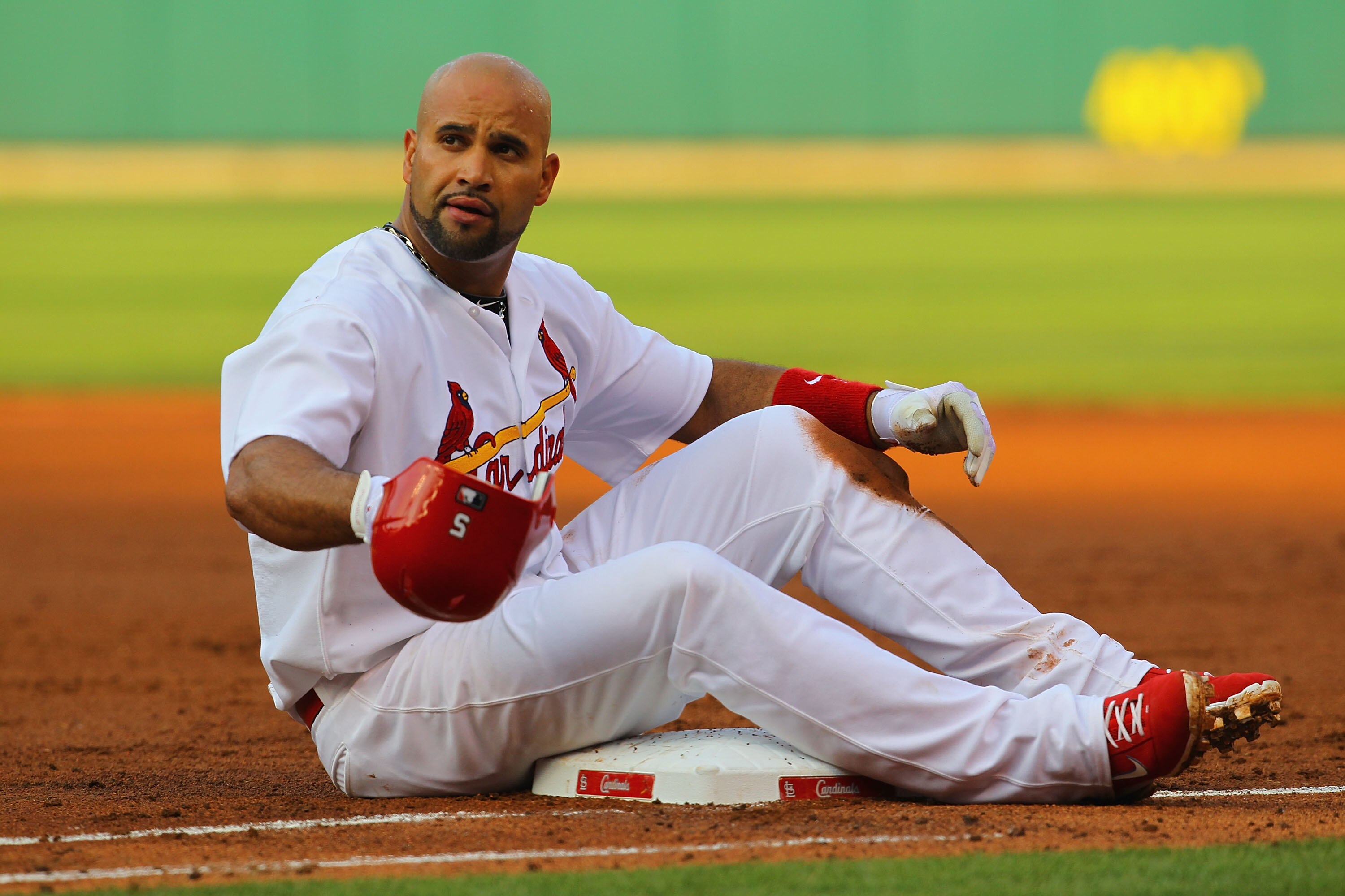 ST. LOUIS, MO - MAY 31: Albert Pujols #5 of the St. Louis Cardinals reacts after being tagged out at first base against the San Francisco Giants at Busch Stadium on May 31, 2011 in St. Louis, Missouri.  (Photo by Dilip Vishwanat/Getty Images)