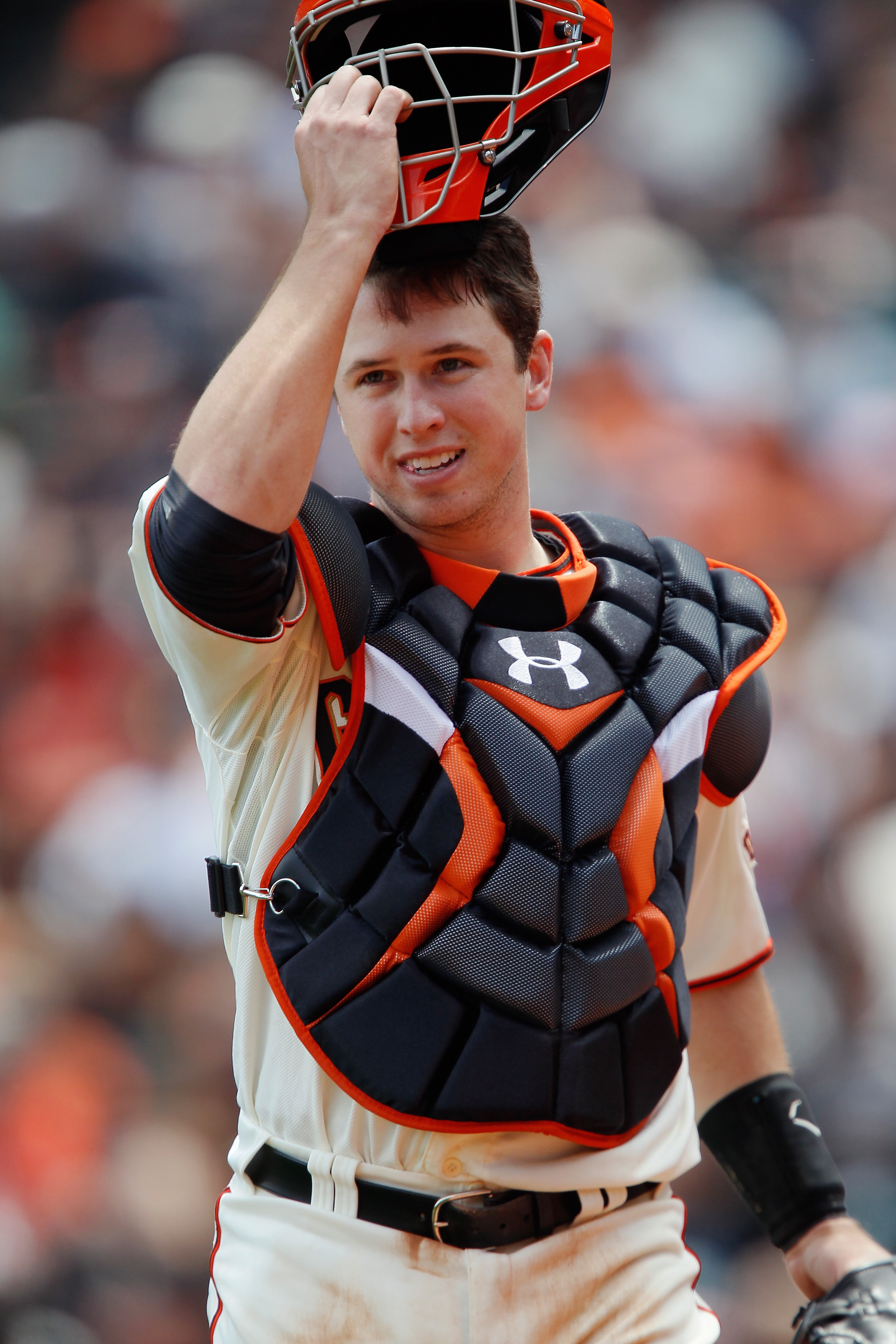 SAN FRANCISCO, CA - MAY 22:  Catcher Buster Posey #28 of the San Francisco Giants heads to the dugout after getting out of an inning against the Oakland A's at AT&T Park on May 22, 2011 in San Francisco, California.  The Giants won 5-4 in 11 innings.  (Ph