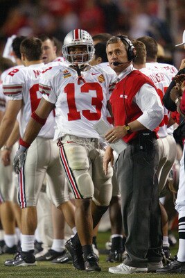 TEMPE, AZ - JANUARY 3:  Head coach Jim Tressel of the Ohio State Buckeyes with running back Maurice Clarett #13 during the Tostitos Fiesta Bowl against the University of Miami Hurricanes at Sun Devil Stadium on January 3, 2003 in Tempe, Arizona.  Ohio Sta
