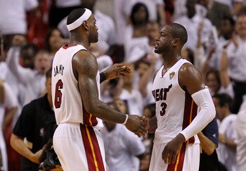 MIAMI, FL - MAY 31:  LeBron James #6 and Dwyane Wade #3 of the Miami Heat react in the fourth quarter before the Heat defeat the Dallas Mavericks 92-84 in Game One of the 2011 NBA Finals at American Airlines Arena on May 31, 2011 in Miami, Florida. NOTE T