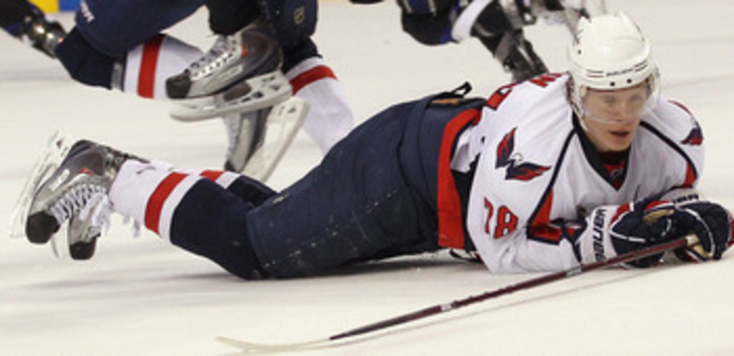 TAMPA, FL - MAY 04: Alexander Semin #28 of the Washington Capitals slides under Steve Downie #9 of the Tampa Bay Lightning in Game Four of the Eastern Conference Semifinals during the 2011 NHL Stanley Cup Playoffs at the St Pete Times Forum on May 4, 2011 TAMPA, FL - MAY 04: Alexander Semin #28 of the Washington Capitals slides under Steve Downie #9 of the Tampa Bay Lightning in Game Four of the Eastern Conference Semifinals during the 2011 NHL Stanley Cup Playoffs at the St Pete Times Forum on May 4, 2011