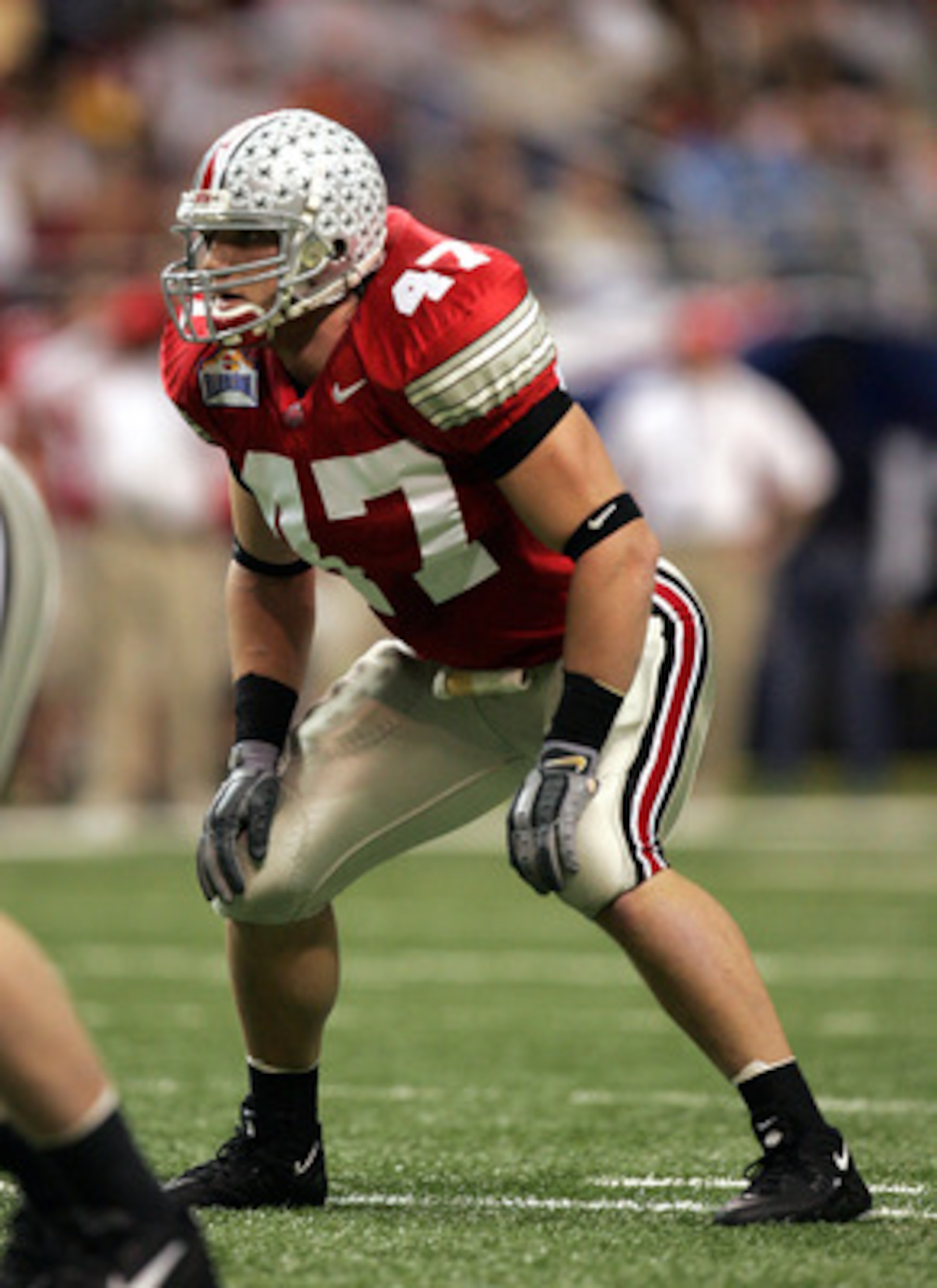 SAN ANTONIO, TX - DECEMBER 29:  Linebacker A.J. Hawk #47 of the Ohio State Buckeyes looks on against the Oklahoma State Cowboys during the MasterCard Alamo Bowl on December 29, 2004 at the Alamodome in San Antonio, Texas.  The Buckeyes defeated the Cowboy