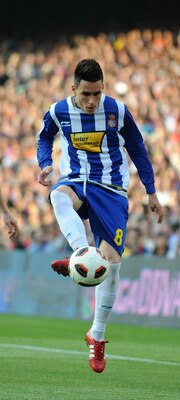 BARCELONA, SPAIN - MAY 08: Jose Callejon (R) of Espanyol passes the ball beside Andreu Fontas of Barcelona during the La Liga match between Barcelona and Espanyol at Nou Camp on May 8, 2011 in Barcelona, Spain.  (Photo by Denis Doyle/Getty Images)