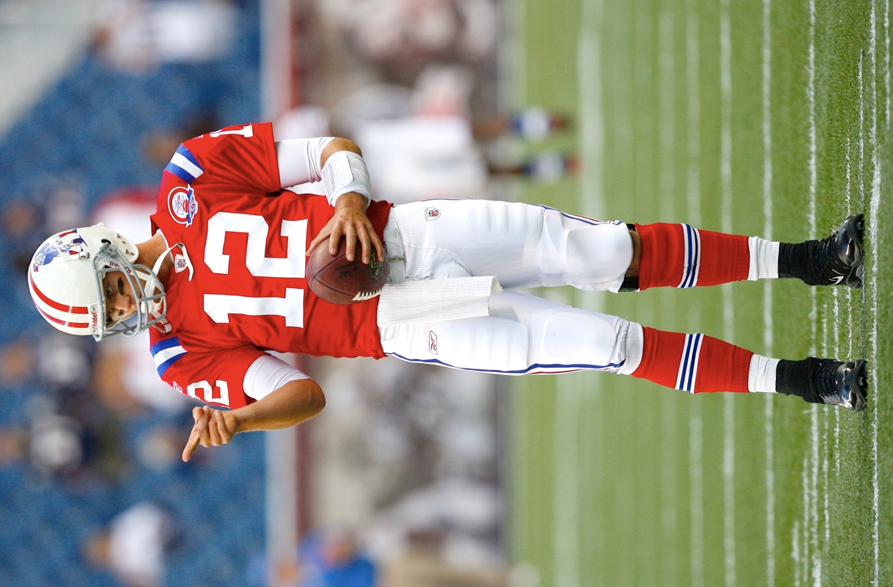 FOXBORO, MA - SEPTEMBER 14:  Quarterback Tom Brady #12 of the New England Patriots warms up before the game against the Buffalo Bills on September 14, 2009 at Gillette Stadium in Foxboro, Massachusetts. (Photo by Jim Rogash/Getty Images)