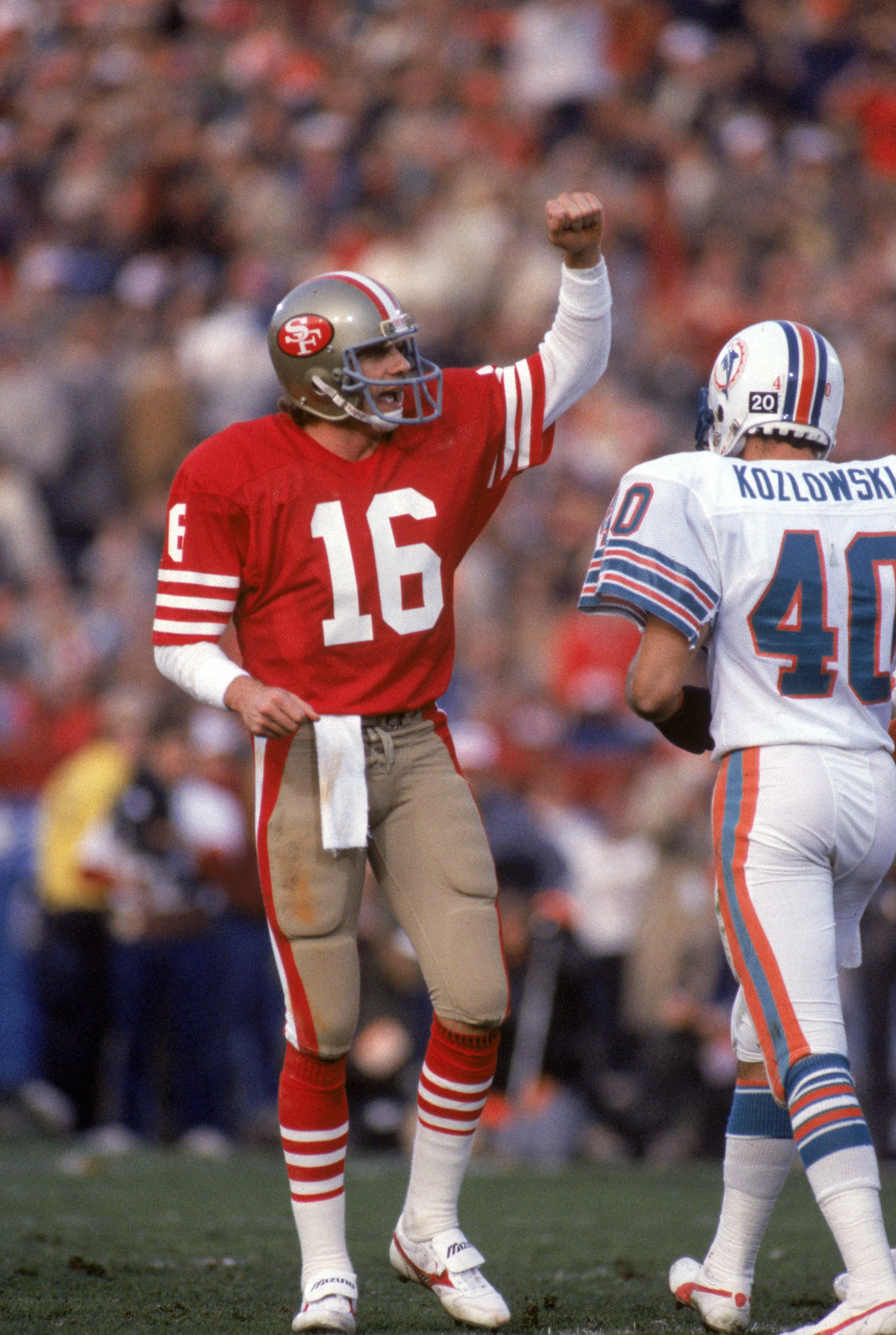 STANFORD, CA - JANUARY 20:  Quarterback Joe Montana #16 of the San Francisco 49ers celebrates following Roger Craig second touchdown on a two yard run in Super Bowl XIX against the Miami Dolphins at Stanford Stadium on January 20, 1985 in Stanford, Califo