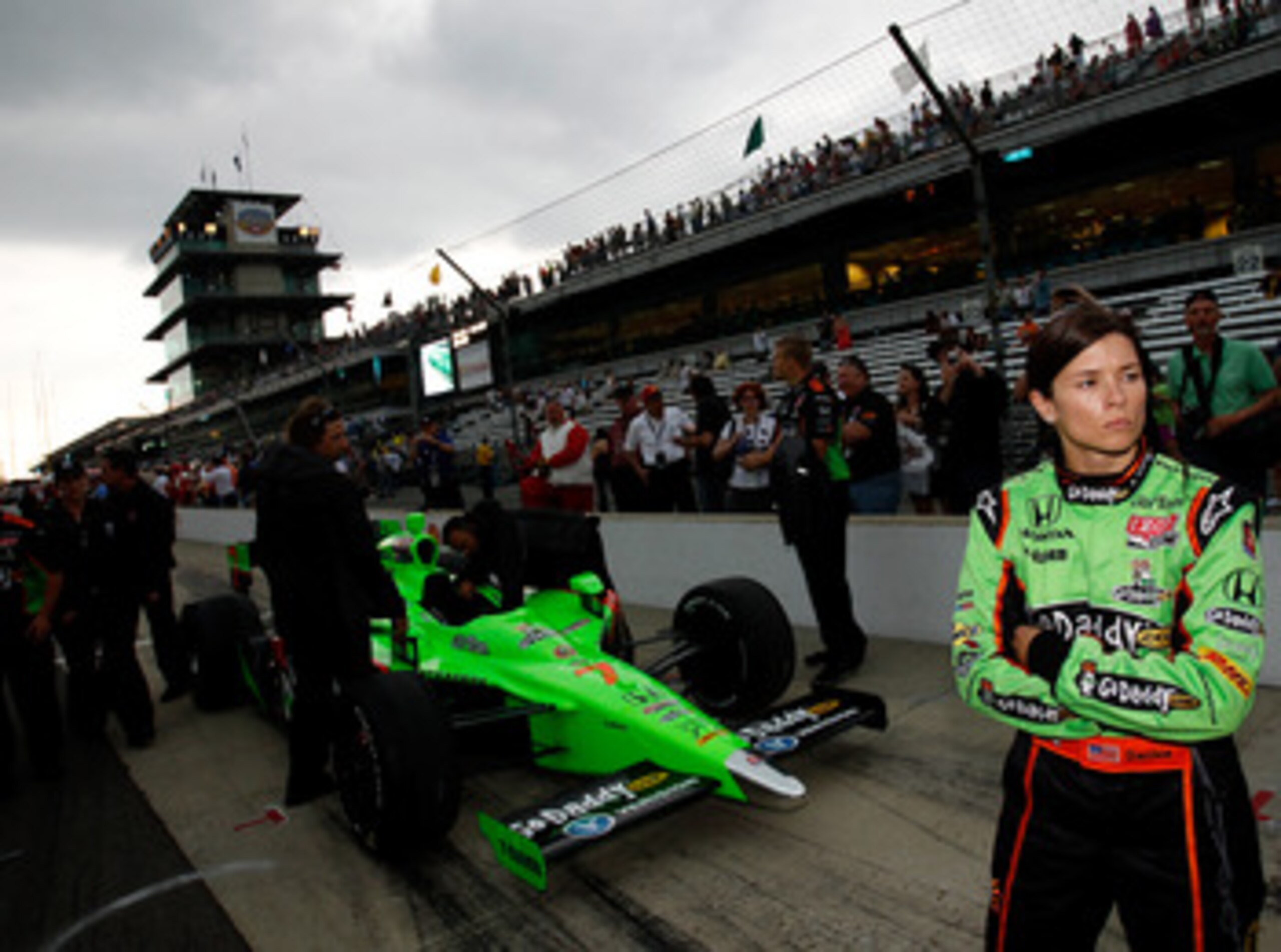 INDIANAPOLIS - MAY 22:  Danica Patrick waits to drive her #7 Team GoDaddy Andretti Autosport Dallara Honda during qualifying for the the 95th Indianapolis 500 Mile Race at the Indianapolis Motor Speedway on May 22, 2011 in Indianapolis, Indiana.  (Photo b