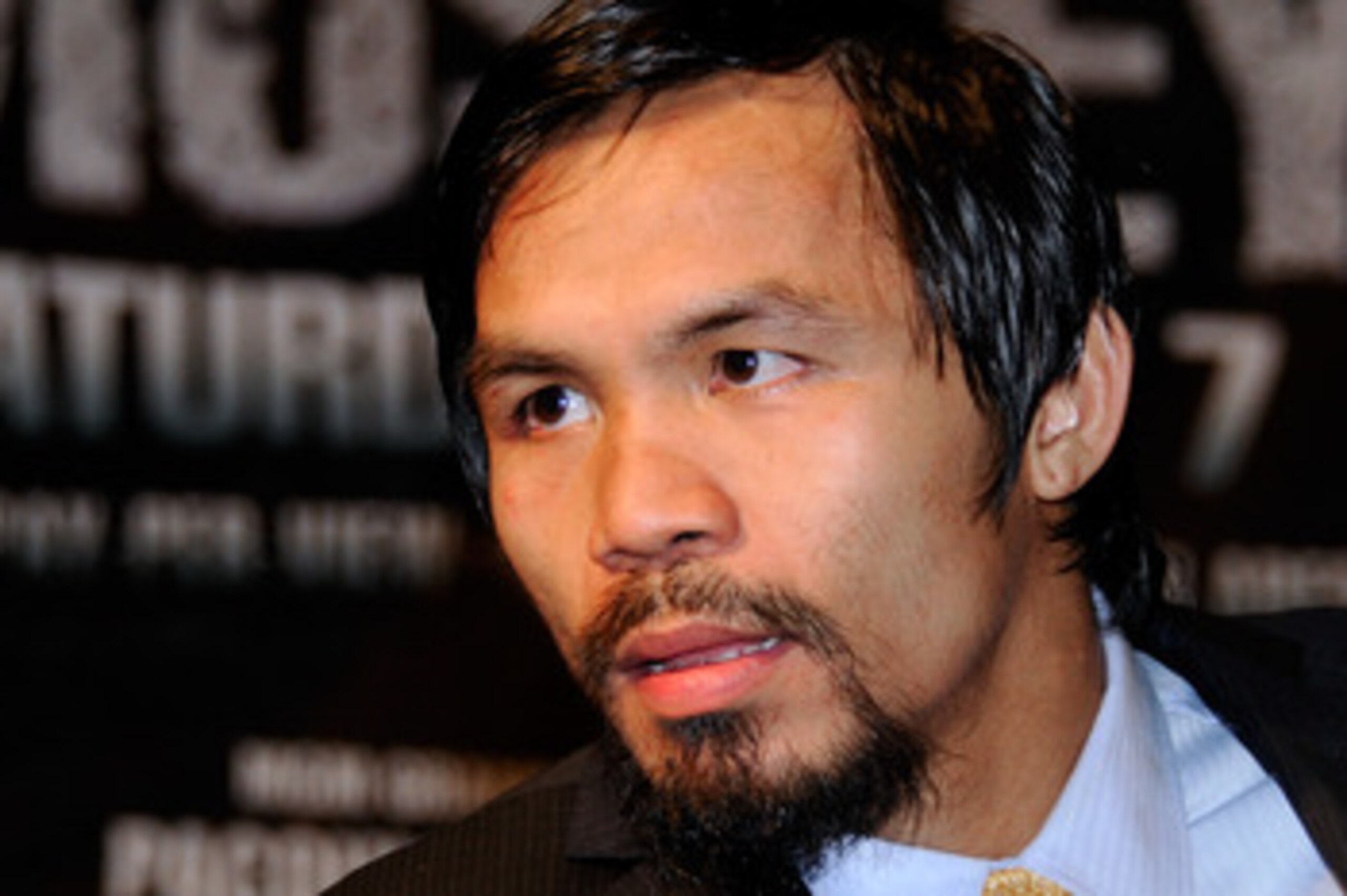 LAS VEGAS, NV - MAY 07:  Manny Pacquiao (R) throws a right at Shane Mosley in the sixth round of their WBO welterweight title fight at the MGM Grand Garden Arena May 7, 2011 in Las Vegas, Nevada. Pacquiao retained his title with a unanimous-decision victo