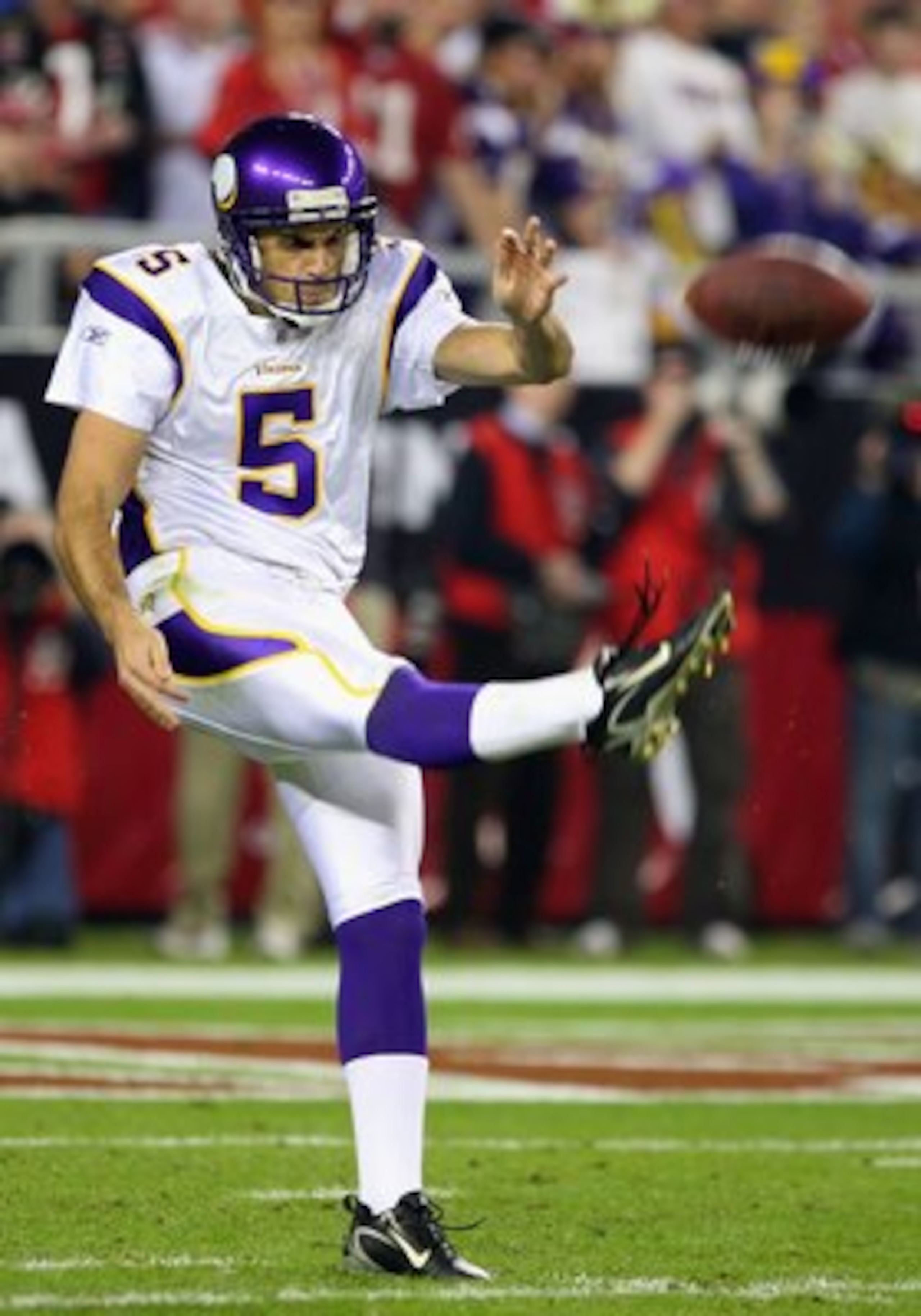GLENDALE, AZ - DECEMBER 06:  Punter Chris Kluwe #5 of the Minnesota Vikings kicks the ball during the NFL game against the Arizona Cardinals at the Universtity of Phoenix Stadium on December 6, 2009 in Glendale, Arizona.  The Cardinals defeated the Viking