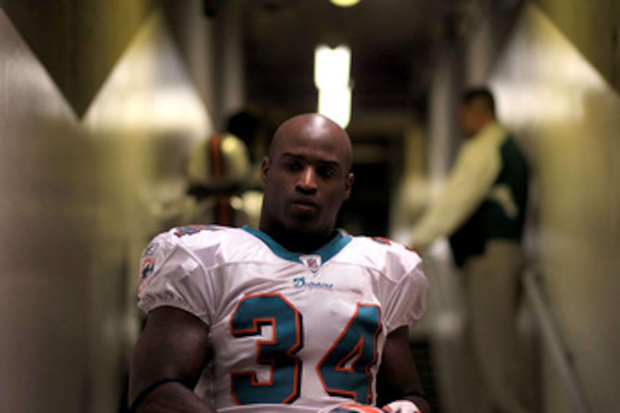OAKLAND, CA - NOVEMBER 28: Ricky Williams #34 of the Miami Dolphins walks down the tunnel for their game against the Oakland Raiders at Oakland-Alameda County Coliseum on November 28, 2010 in Oakland, California. (Photo by Ezra Shaw/Getty Images) OAKLAND, CA - NOVEMBER 28: Ricky Williams #34 of the Miami Dolphins walks down the tunnel for their game against the Oakland Raiders at Oakland-Alameda County Coliseum on November 28, 2010 in Oakland, California. (Photo by Ezra Shaw/Getty Images)