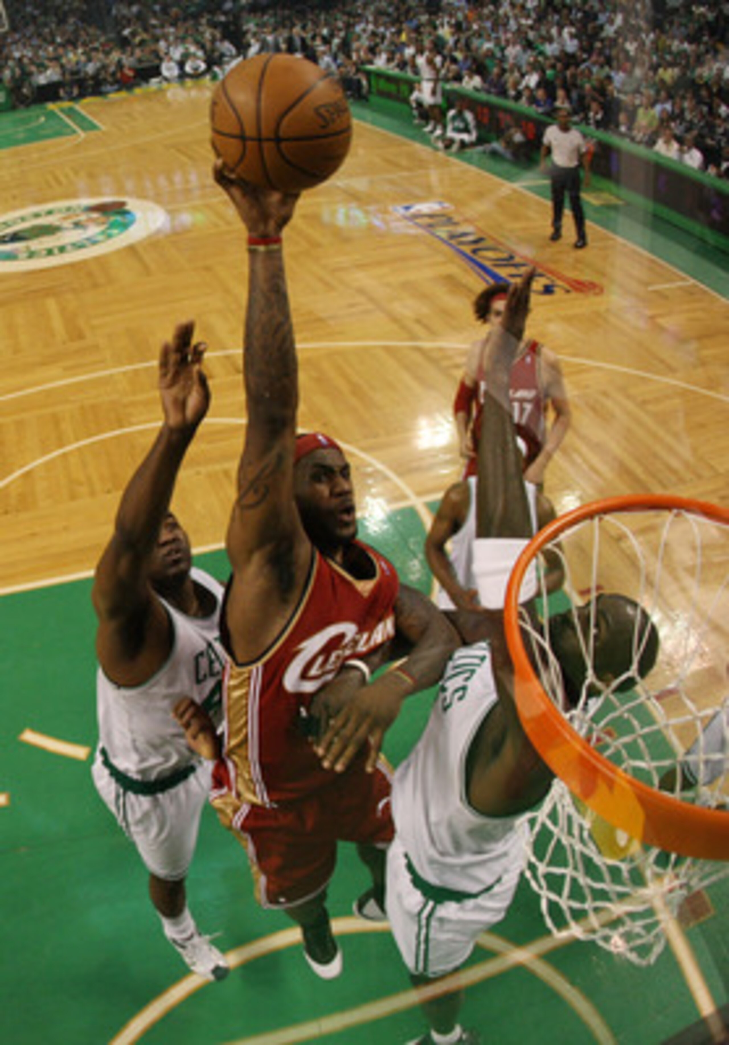 BOSTON - MAY 06:  LeBron James #23 of the Cleveland Cavaliers tries to get a shot over Kevin Garnett #5 and Kendrick Perkins #43 of the Boston Celtics during Game One of the Eastern Conference Semifinals during the 2008 NBA Playoffs on May 6, 2008 at the 
