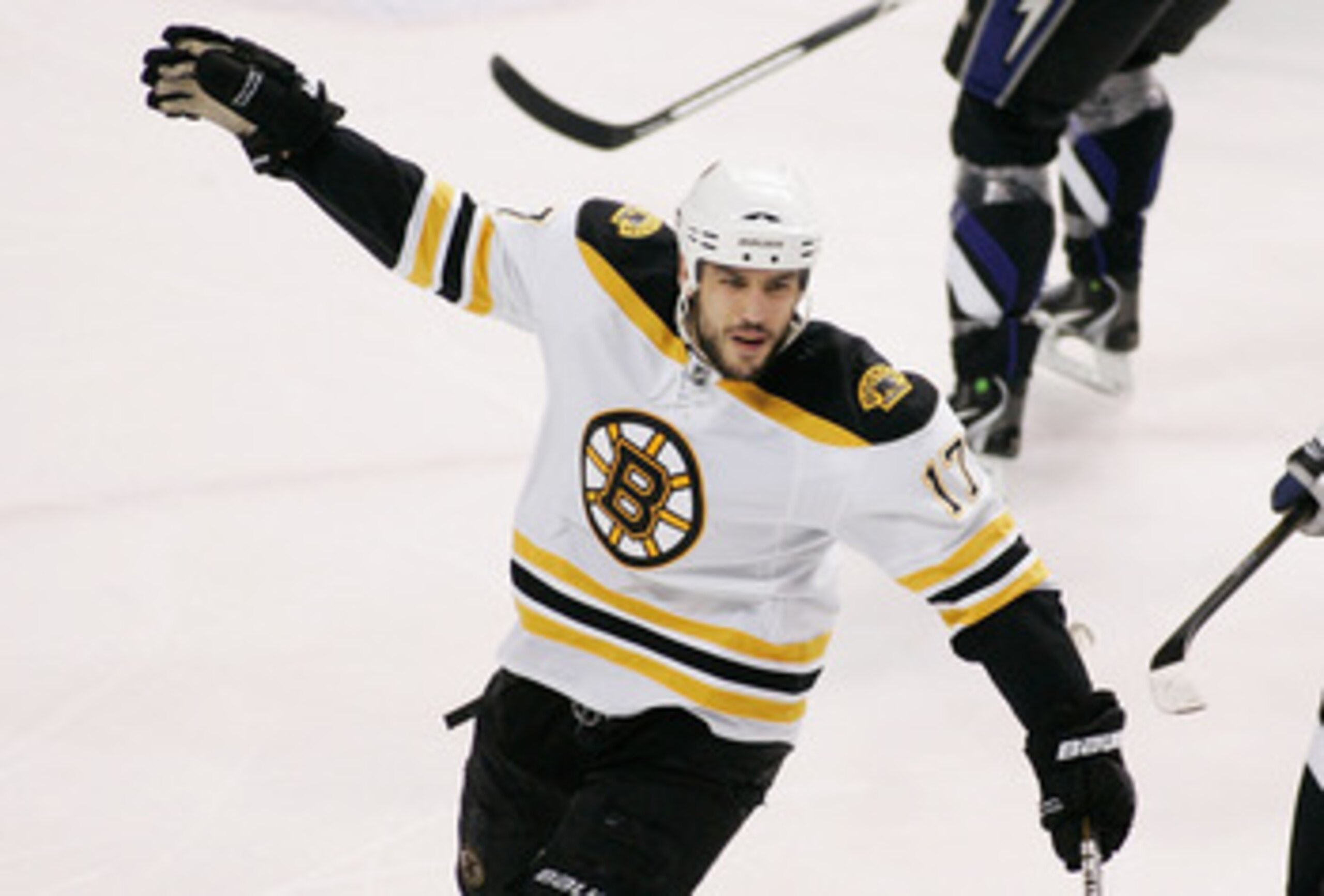 TAMPA, FL - MAY 25:  Milan Lucic #17 of the Boston Bruins celebrates his first period goal against the Tampa Bay Lightning in Game Six of the Eastern Conference Finals during the 2011 NHL Stanley Cup Playoffs at St Pete Times Forum on May 25, 2011 in Tamp