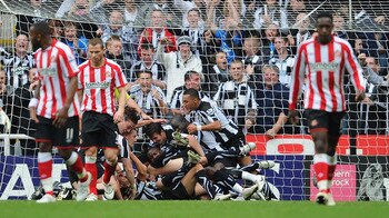 NEWCASTLE UPON TYNE, ENGLAND - OCTOBER 31:  Newcastle players celebrate the first goal by Kevin Nolan during the Barclays Premier League match between Newcastle United and Sunderland at St James' Park on October 31, 2010 in Newcastle upon Tyne, England.