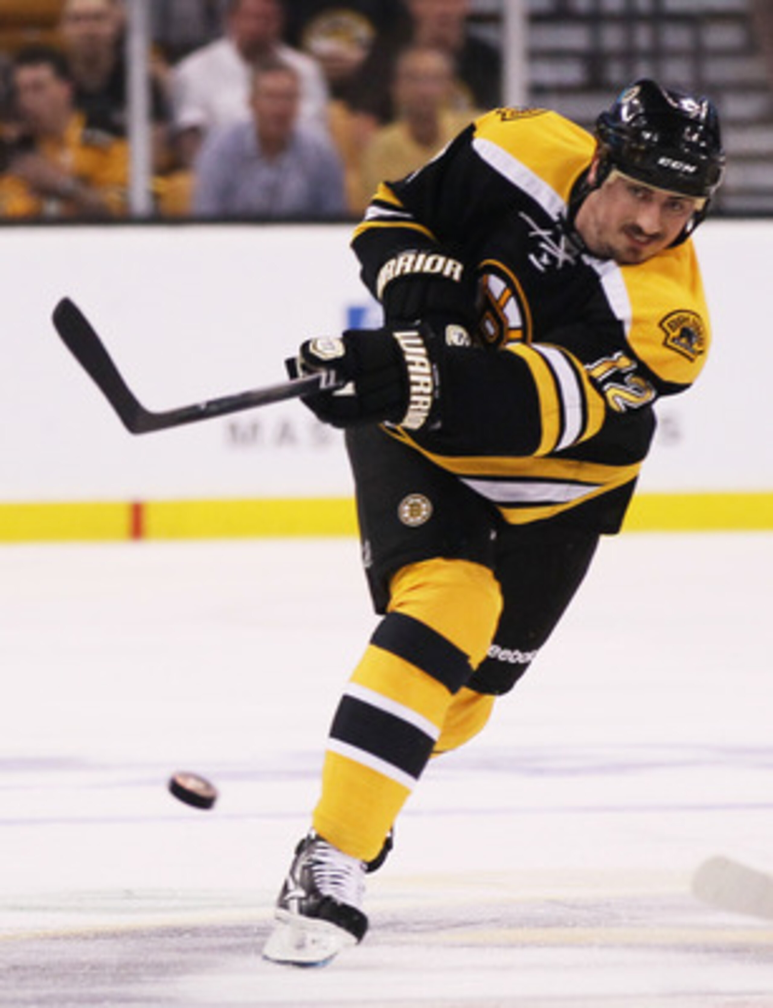 BOSTON, MA - MAY 27:  Tomas Kaberle #12 of the Boston Bruins controls the puck in Game Seven of the Eastern Conference Finals against the Tampa Bay Lightning during the 2011 NHL Stanley Cup Playoffs at TD Garden on May 27, 2011 in Boston, Massachusetts.  