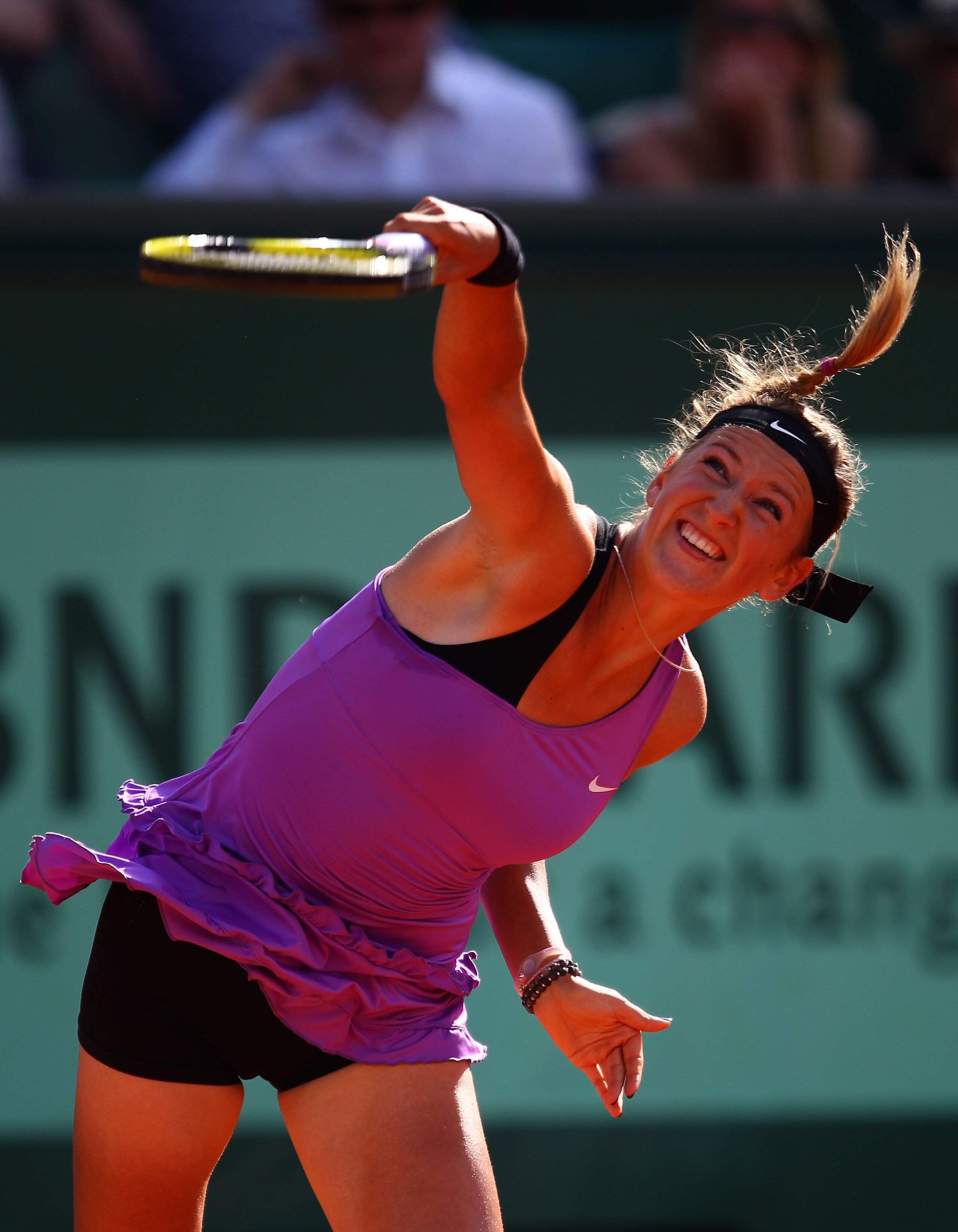 PARIS, FRANCE - MAY 30:  Victoria Azarenka of Belarus serves during the women's singles round four match between Ekaterina Makarova of Russia and Victoria Azarenka of Belarus on day nine of the French Open at Roland Garros on May 30, 2011 in Paris, France