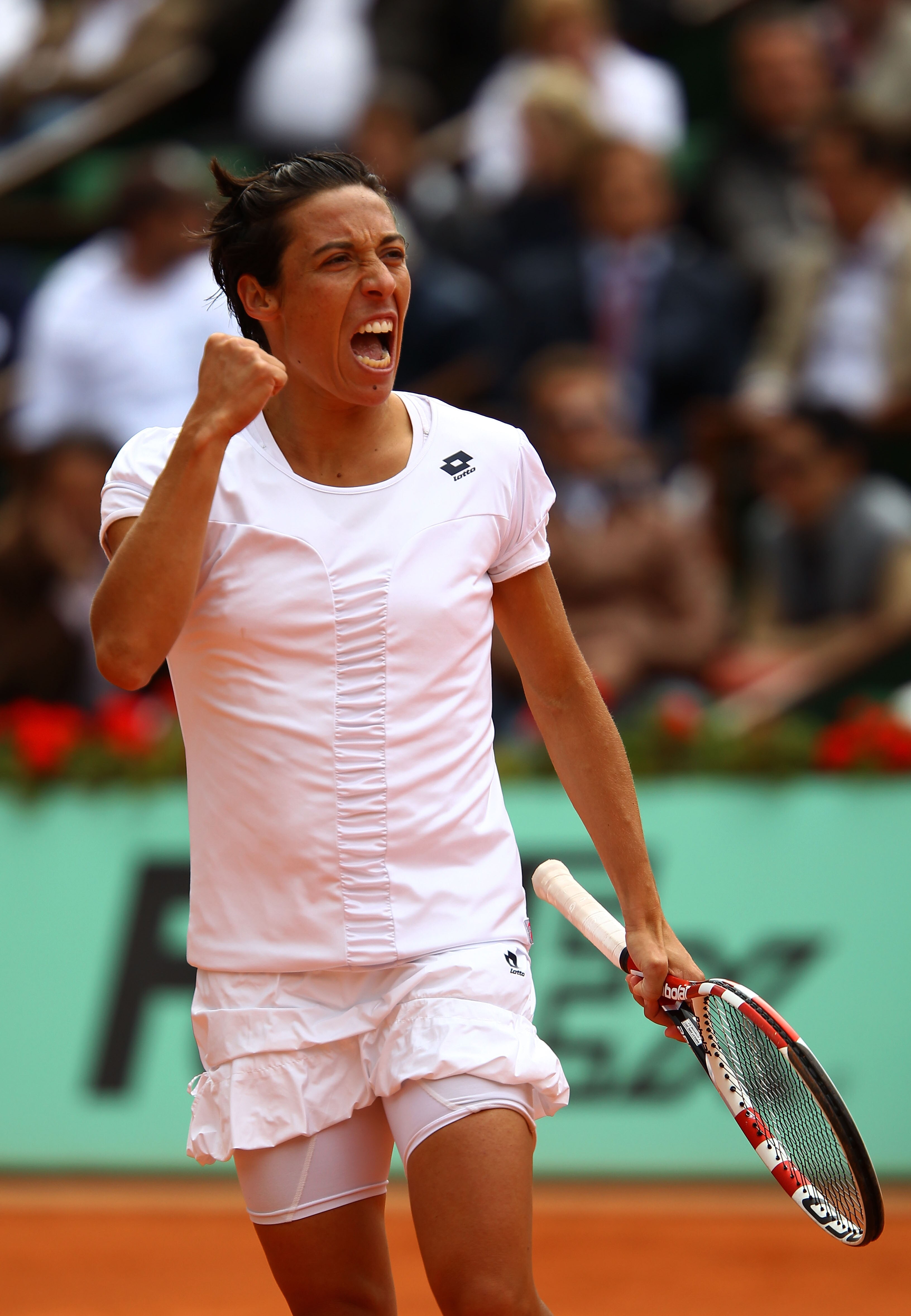 PARIS, FRANCE - MAY 31:  Francesca Schiavone of Italy celebrates a point during the women's singles quarterfinal match between Anastasia Pavlyuchenkova of Russia and Francesca Schiavone of Italy on day ten of the French Open at Roland Garros on May 31, 20