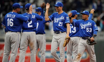 MINNEAPOLIS, MN - APRIL 13: Jeff Francoeur #21 and Melky Cabrera #53 of the Kansas City Royals celebrate a 10-5 win against the Minnesota Twins following their game on April 13, 2011 at Target Field in Minneapolis, Minnesota. Royals defeated the Twins 10-