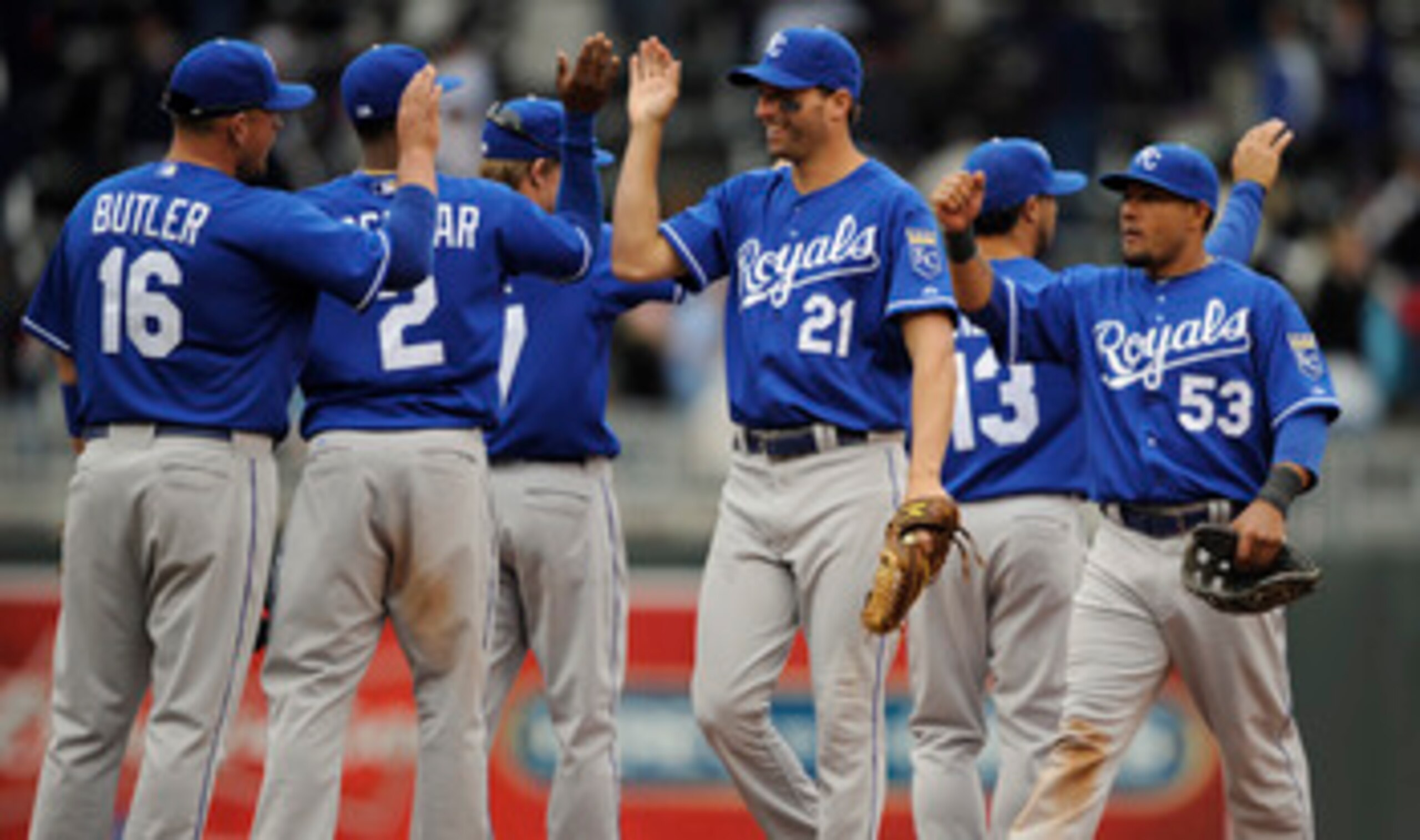 MINNEAPOLIS, MN - APRIL 13: Jeff Francoeur #21 and Melky Cabrera #53 of the Kansas City Royals celebrate a 10-5 win against the Minnesota Twins following their game on April 13, 2011 at Target Field in Minneapolis, Minnesota. Royals defeated the Twins 10- MINNEAPOLIS, MN - APRIL 13: Jeff Francoeur #21 and Melky Cabrera #53 of the Kansas City Royals celebrate a 10-5 win against the Minnesota Twins following their game on April 13, 2011 at Target Field in Minneapolis, Minnesota. Royals defeated the Twins 10-