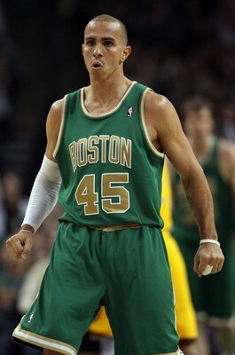 BOSTON, MA - MARCH 16:  Carlos Arroyo #45 of the Boston Celtics celebrates his basket in the second half against the Indiana Pacers on March 16, 2011 at the TD Garden in Boston, Massachusetts. The Celtics defeated the Indiana Pacers 92-80. NOTE TO USER: U