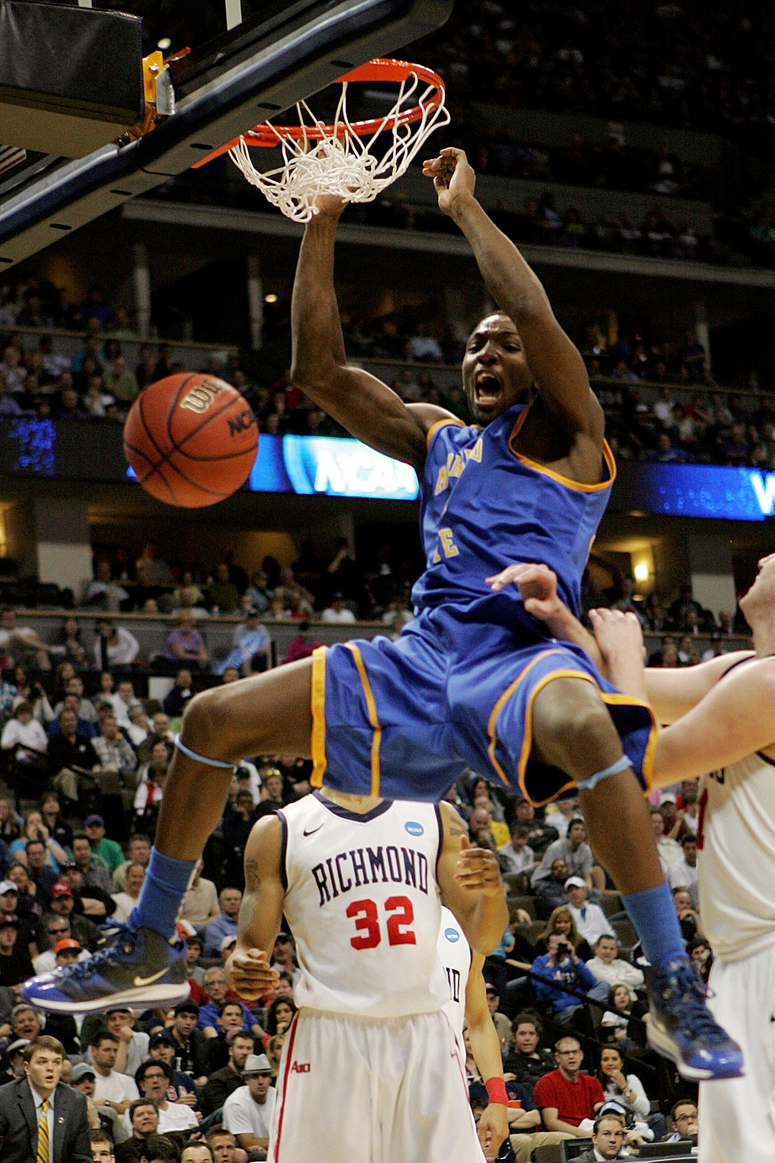 DENVER, CO - MARCH 19:  Kenneth Faried #35 of the Morehead State Eagles dunks the ball against the Richmond Spiders during the third round of the 2011 NCAA men's basketball tournament at Pepsi Center on March 19, 2011 in Denver, Colorado.  (Photo by Justi