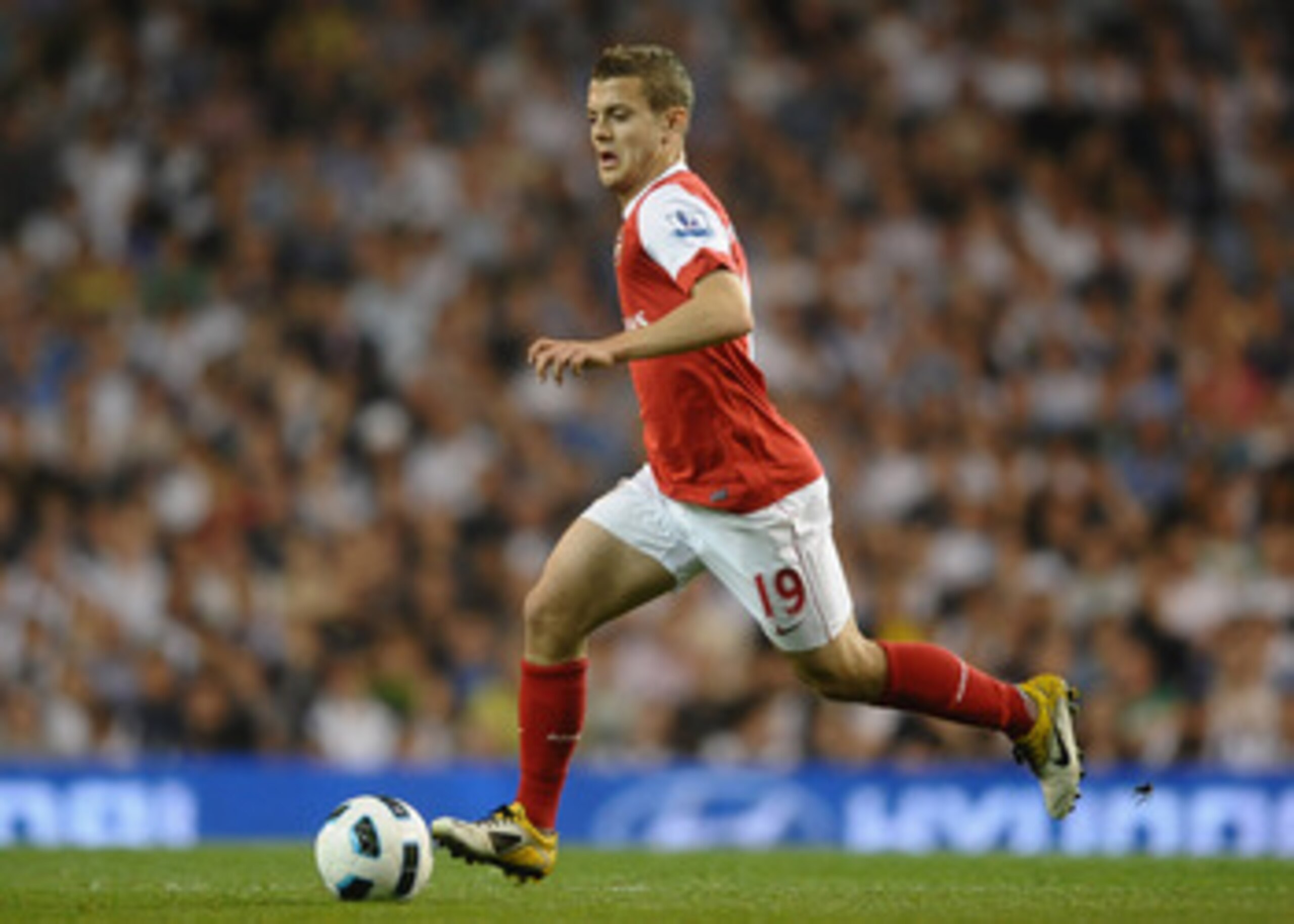 LONDON, ENGLAND - APRIL 20:  Jack Wilshere of Arsenal runs with the ball during the Barclays Premier League match between Tottenham Hotspur and Arsenal at White Hart Lane on April 20, 2011 in London, England.  (Photo by Laurence Griffiths/Getty Images)