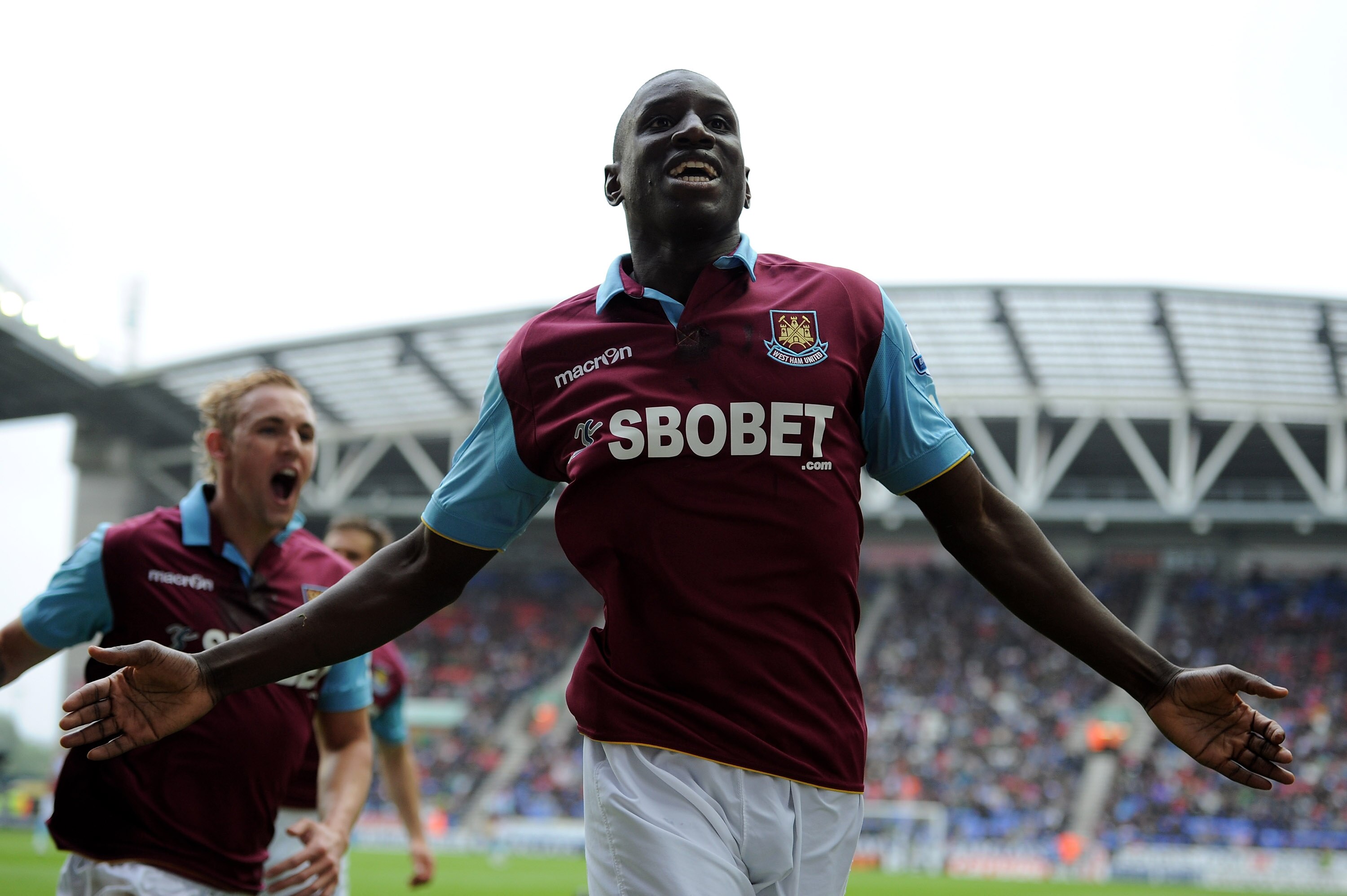 WIGAN, ENGLAND - MAY 15: Demba Ba of West Ham United celebrates scoring the openng goal during the Barclays Premier League match between Wigan Athletic and West Ham United at the DW Stadium on May 15, 2011 in Wigan, England. (Photo by Chris Brunskill/Ge WIGAN, ENGLAND - MAY 15: Demba Ba of West Ham United celebrates scoring the openng goal during the Barclays Premier League match between Wigan Athletic and West Ham United at the DW Stadium on May 15, 2011 in Wigan, England. (Photo by Chris Brunskill/Ge