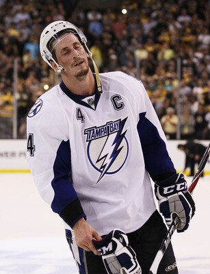 BOSTON, MA - MAY 27:  Vincent Lecavalier #4 of the Tampa Bay Lightning reacts after their 1 to 0 loss to the Boston Bruins in Game Seven of the Eastern Conference Finals during the 2011 NHL Stanley Cup Playoffs at TD Garden on May 27, 2011 in Boston, Mass