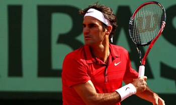PARIS, FRANCE - MAY 31:  Roger Federer of Switzerland hits a forehand during the men's singles quarterfinal match between Gael Monfils of France and Roger Federer of Switzerland on day ten of the French Open at Roland Garros on May 31, 2011 in Paris, Fran