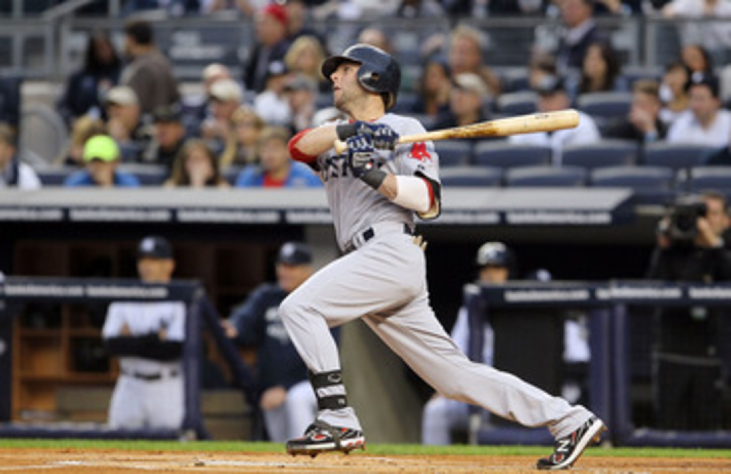 NEW YORK, NY - MAY 14:  Dustin Pedroia #15 of the Boston Red Sox connects on a first inning single against the New York Yankees on May 14, 2011 at Yankee Stadium in the Bronx borough of New York City.  (Photo by Jim McIsaac/Getty Images)