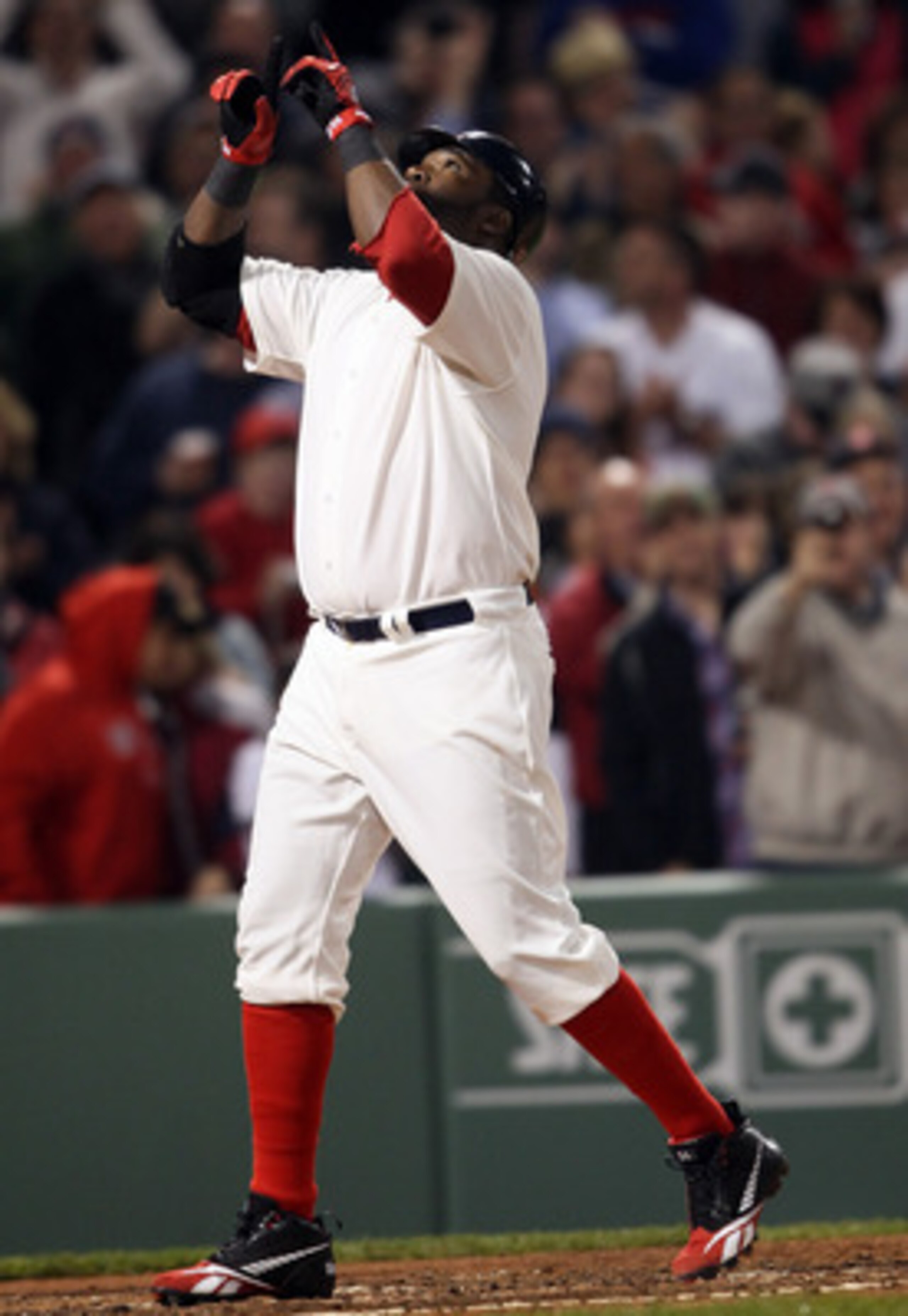 BOSTON, MA - MAY 21:  David Ortiz #34 of the Boston Red Sox celebrates his two run homer in the fourth inning against the Chicago Cubs on May 21, 2011 at Fenway Park in Boston, Massachusetts. Tonight the Chicago Cubs and the Boston Red Sox are wearing rep