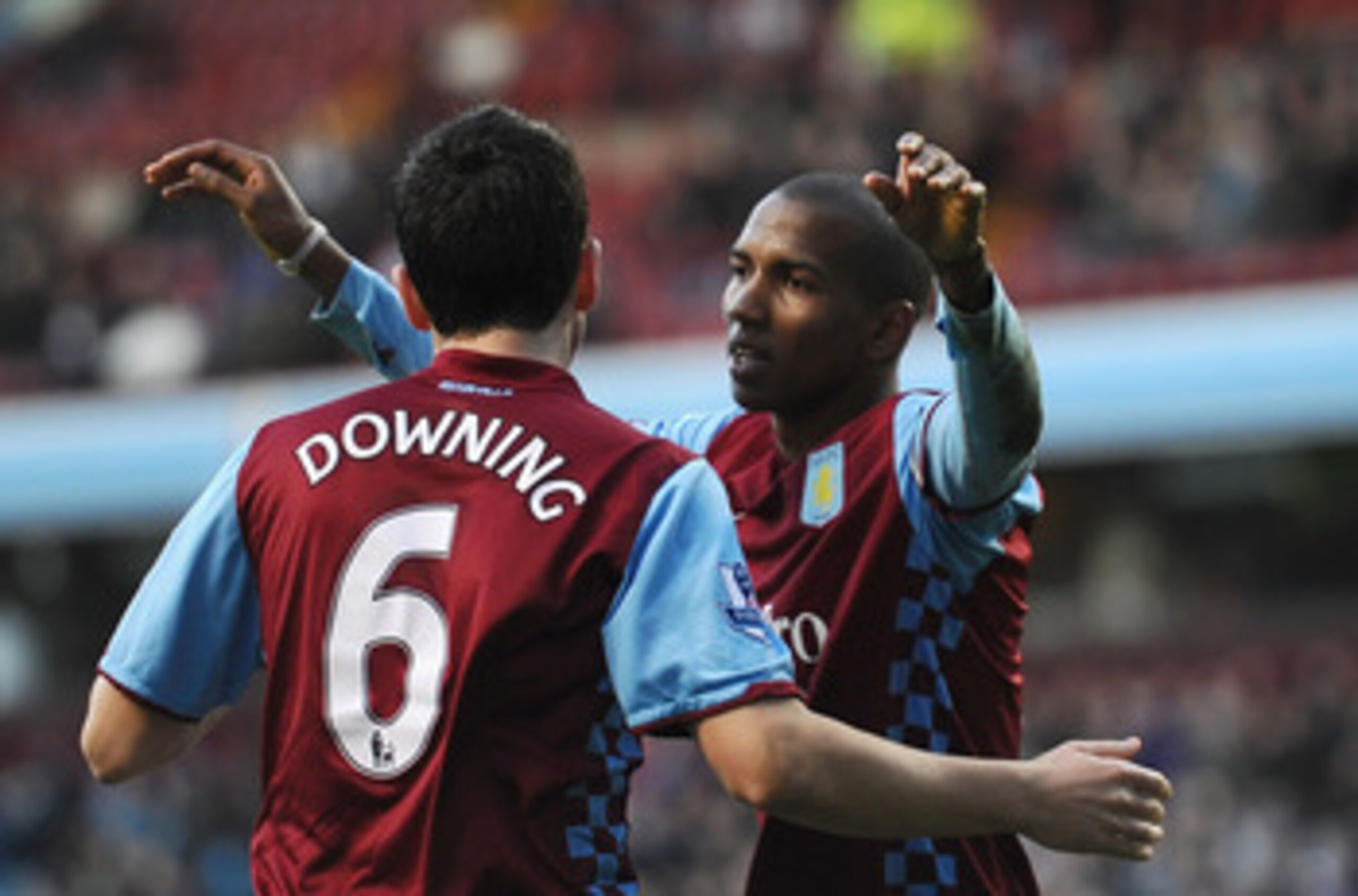 BIRMINGHAM, ENGLAND - FEBRUARY 26: Ashley Young of Aston Villa celebrates his second goal with Stewart Downing  during the Barclays Premier League match between Aston Villa and Blackburn Rovers at Villa Park on February 26, 2011 in Birmingham, England.  (