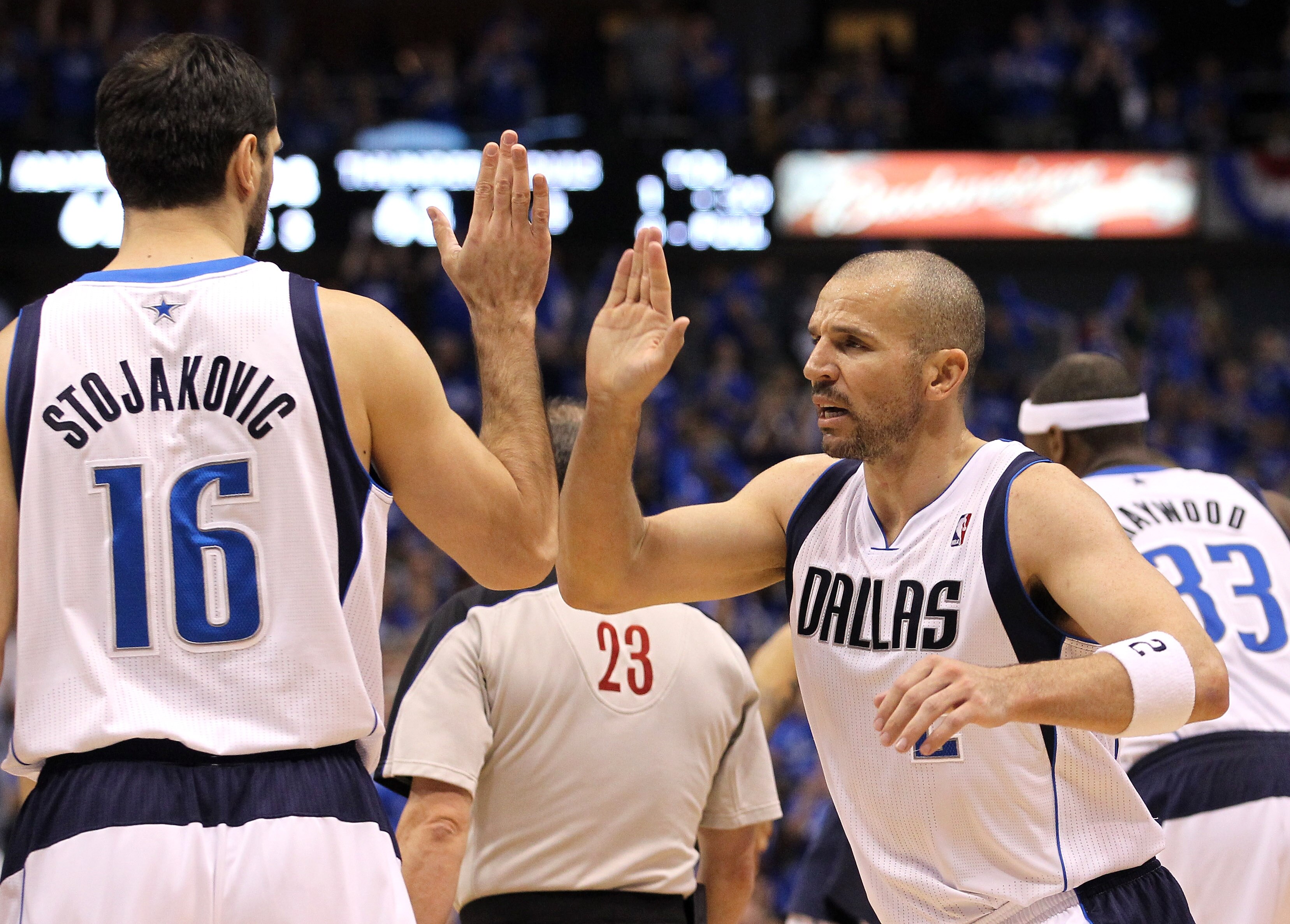 DALLAS, TX - MAY 25:  Jason Kidd #2 and Peja Stojakovic #16 of the Dallas Mavericks react in the third quarter while taking on the Oklahoma City Thunder in Game Five of the Western Conference Finals during the 2011 NBA Playoffs at American Airlines Center