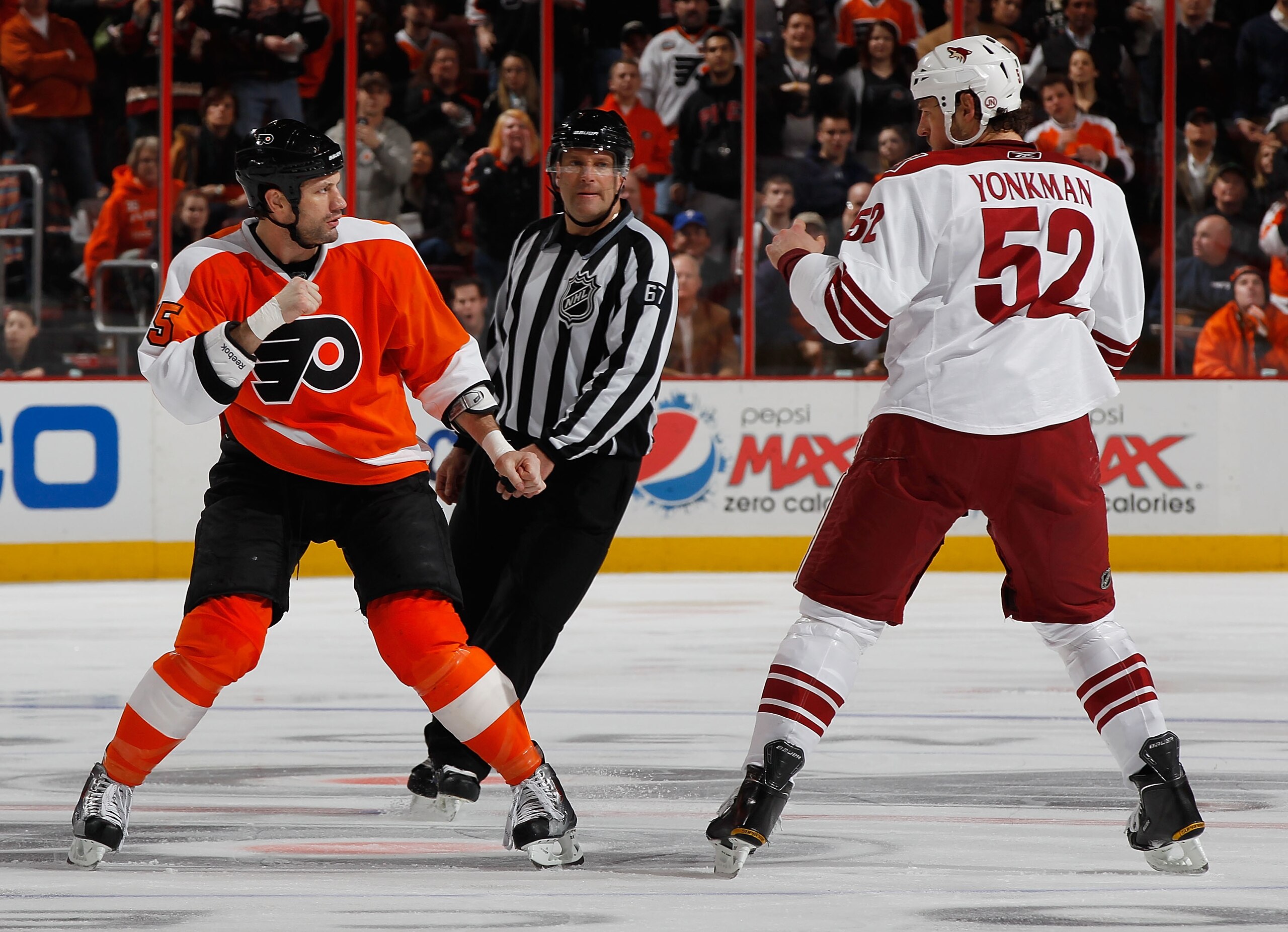 PHILADELPHIA - FEBRUARY 22: Jody Shelley #45 of the Philadelphia Flyers and Nolan Yonkman #52 of the Phoenix Coyotes exchange punches on February 22, 2011 at the Wells Fargo Center in Philadelphia, Pennsylvania. Coyotes defeat the Flyers 3-2 in OT. (Pho PHILADELPHIA - FEBRUARY 22: Jody Shelley #45 of the Philadelphia Flyers and Nolan Yonkman #52 of the Phoenix Coyotes exchange punches on February 22, 2011 at the Wells Fargo Center in Philadelphia, Pennsylvania. Coyotes defeat the Flyers 3-2 in OT. (Pho
