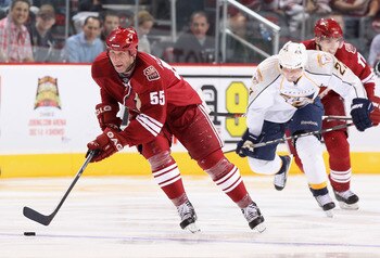 GLENDALE, AZ - NOVEMBER 03:  Ed Jovanovski #55 of the Phoenix Coyotes skates with the puck during the NHL game against the Nashville Predators at Jobing.com Arena on November 3, 2010 in Glendale, Arizona. The Coyotes defeated the Predators 4-3.  (Photo by