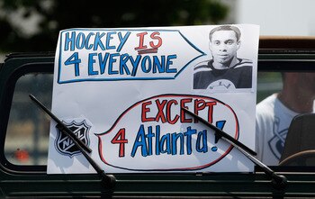 ATLANTA, GA - MAY 21:  Atlanta Thrashers fans rally and put up signs to help keep the team in Atlanta at Philips Arena on May 21, 2011 in Atlanta, Georgia.  It has been reported the Thrashers may relocate to Winnipeg, Canada.  (Photo by Kevin C. Cox/Getty