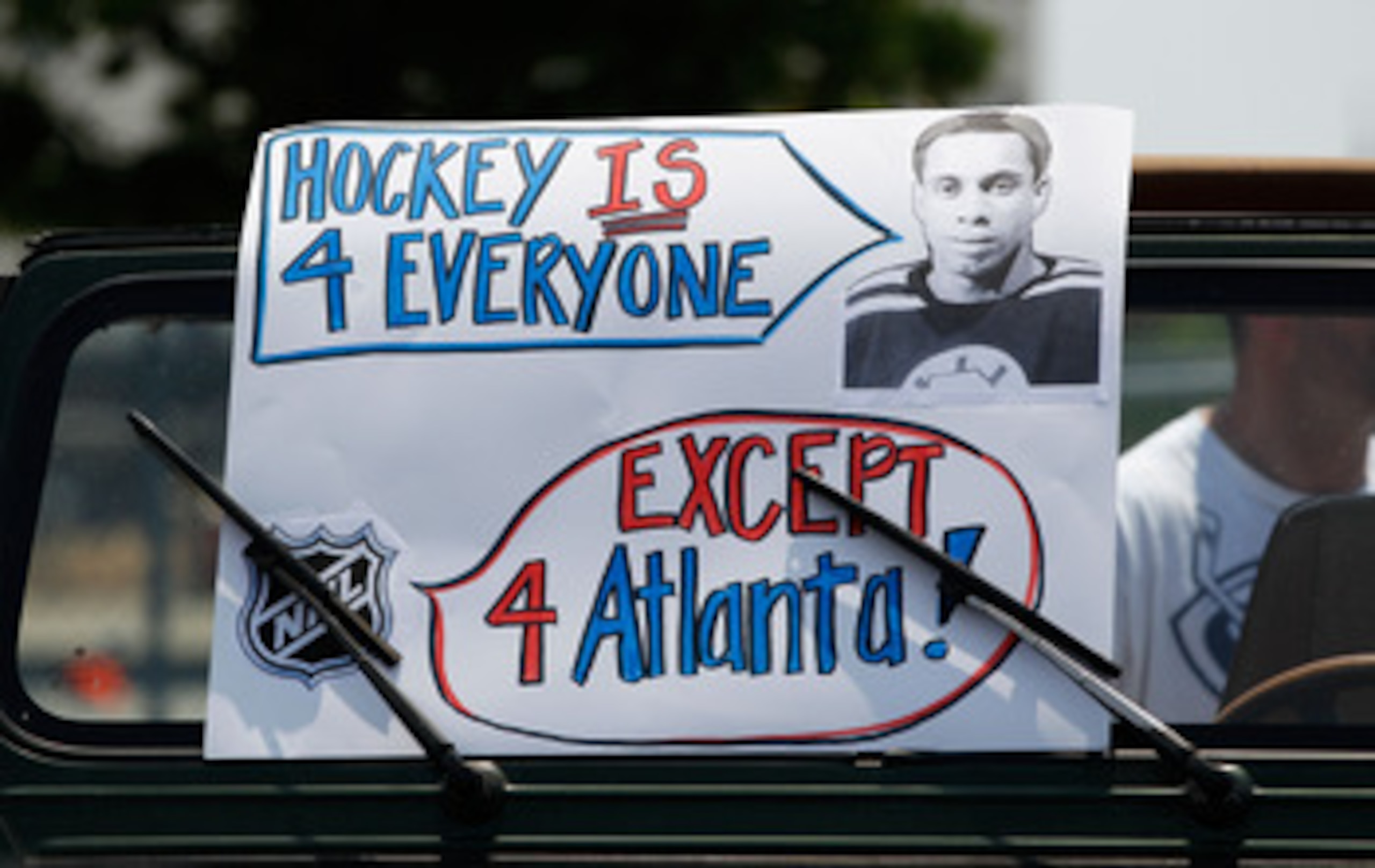 ATLANTA, GA - MAY 21:  Atlanta Thrashers fans rally and put up signs to help keep the team in Atlanta at Philips Arena on May 21, 2011 in Atlanta, Georgia.  It has been reported the Thrashers may relocate to Winnipeg, Canada.  (Photo by Kevin C. Cox/Getty