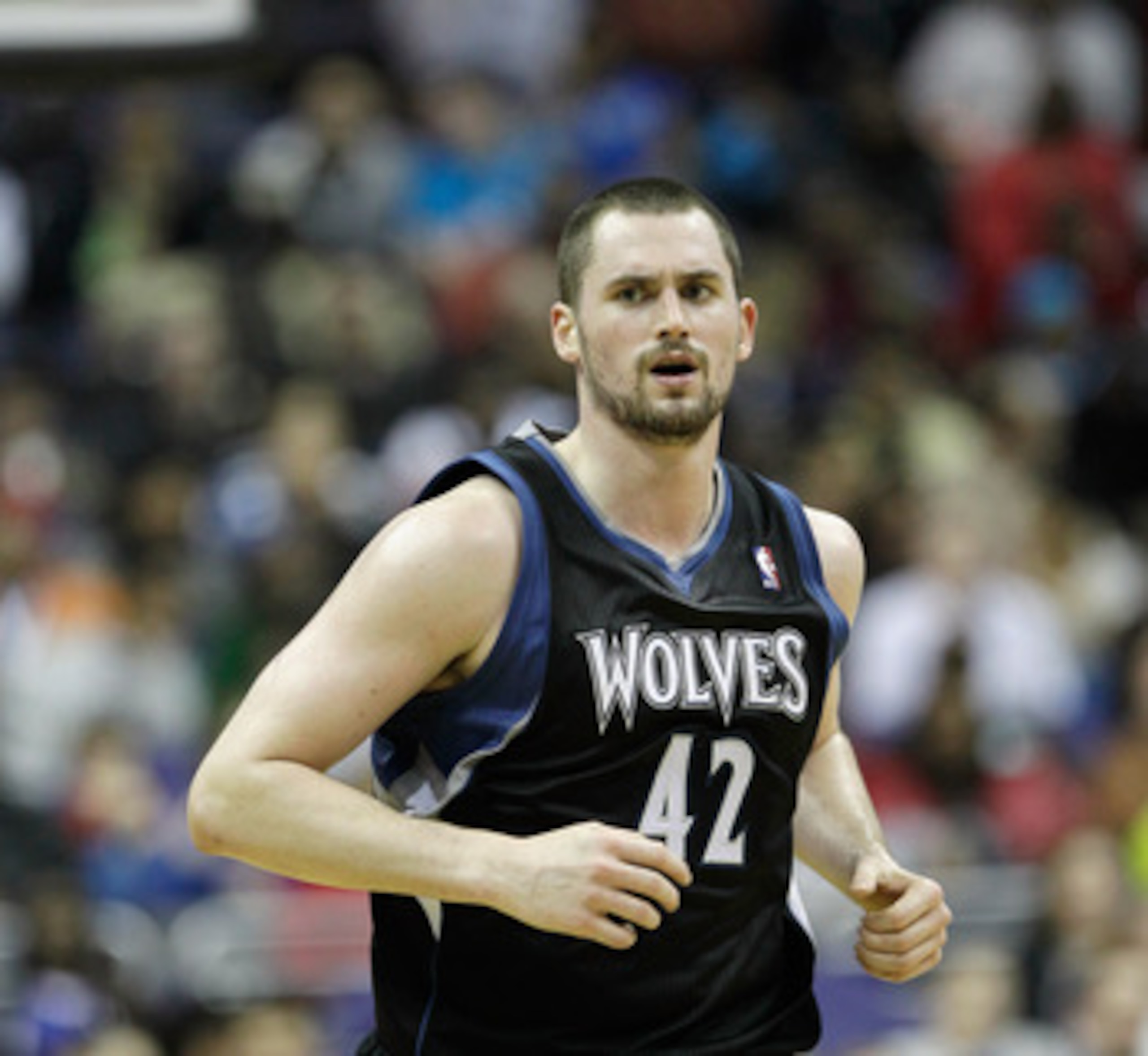 WASHINGTON, DC - MARCH 05:  Kevin Love #42 of the Minnesota Timberwolves against the Washington Wizards at the Verizon Center on March 5, 2011 in Washington, DC. NOTE TO USER: User expressly acknowledges and agrees that, by downloading and/or using this P