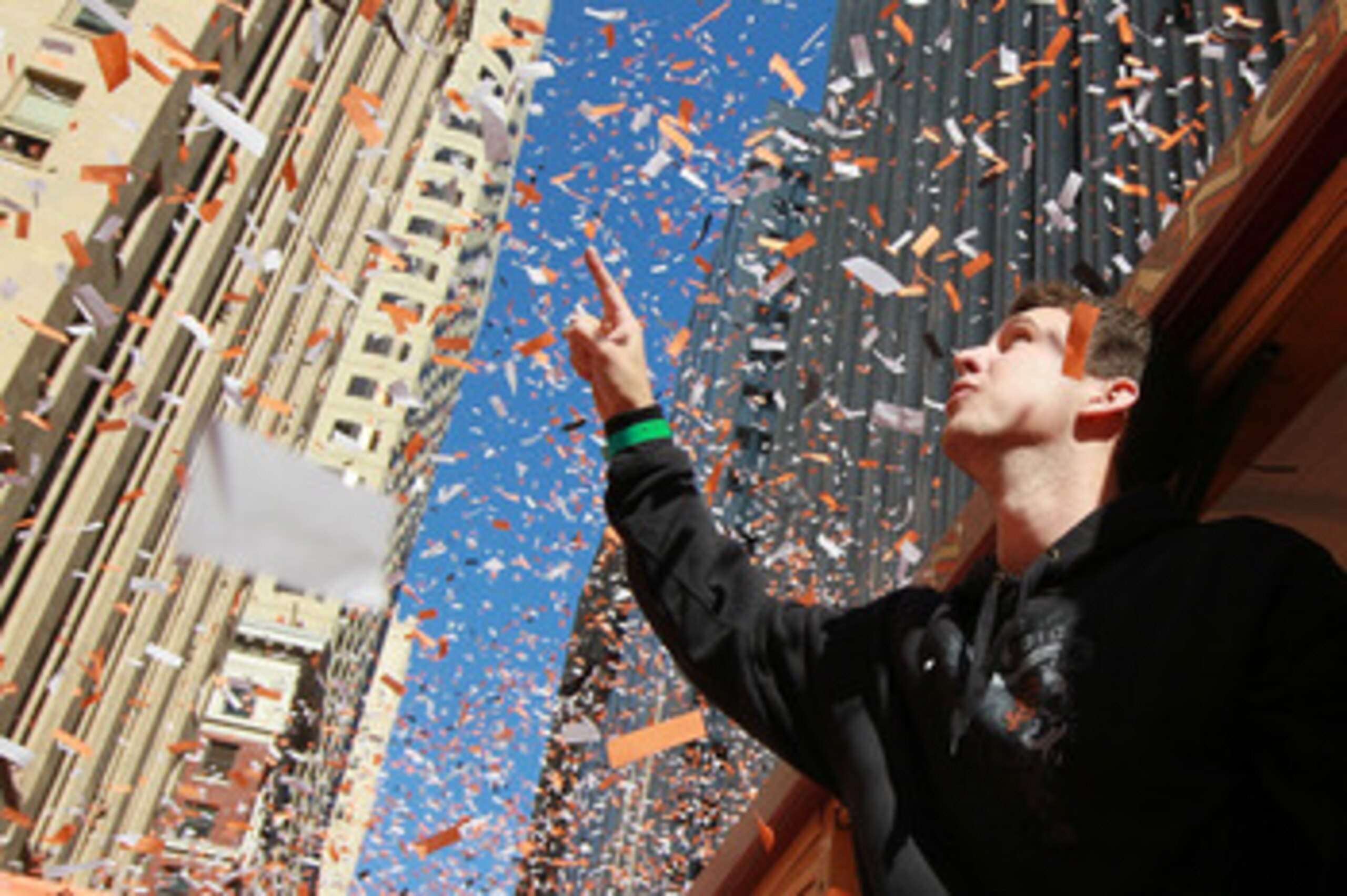 SAN FRANCISCO - NOVEMBER 03:  Buster Posey of the San Francisco Giants celebrates during the Giants' vicotry parade on November 3, 2010 in San Francisco, California. Thousands of Giants fans lined the streets of San Francisco to watch the San Francisco Gi