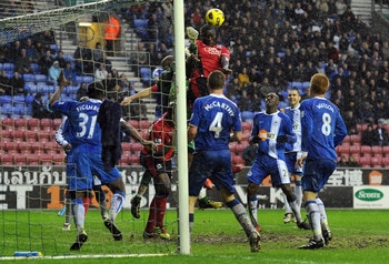 WIGAN, ENGLAND - FEBRUARY 05:  Chris Samba of Blackburn Rovers heads his side's second goal during the Barclays Premier League match between Wigan Athletic and Blackburn Rovers at DW Stadium on February 5, 2011 in Wigan, England.  (Photo by Chris Brunskil