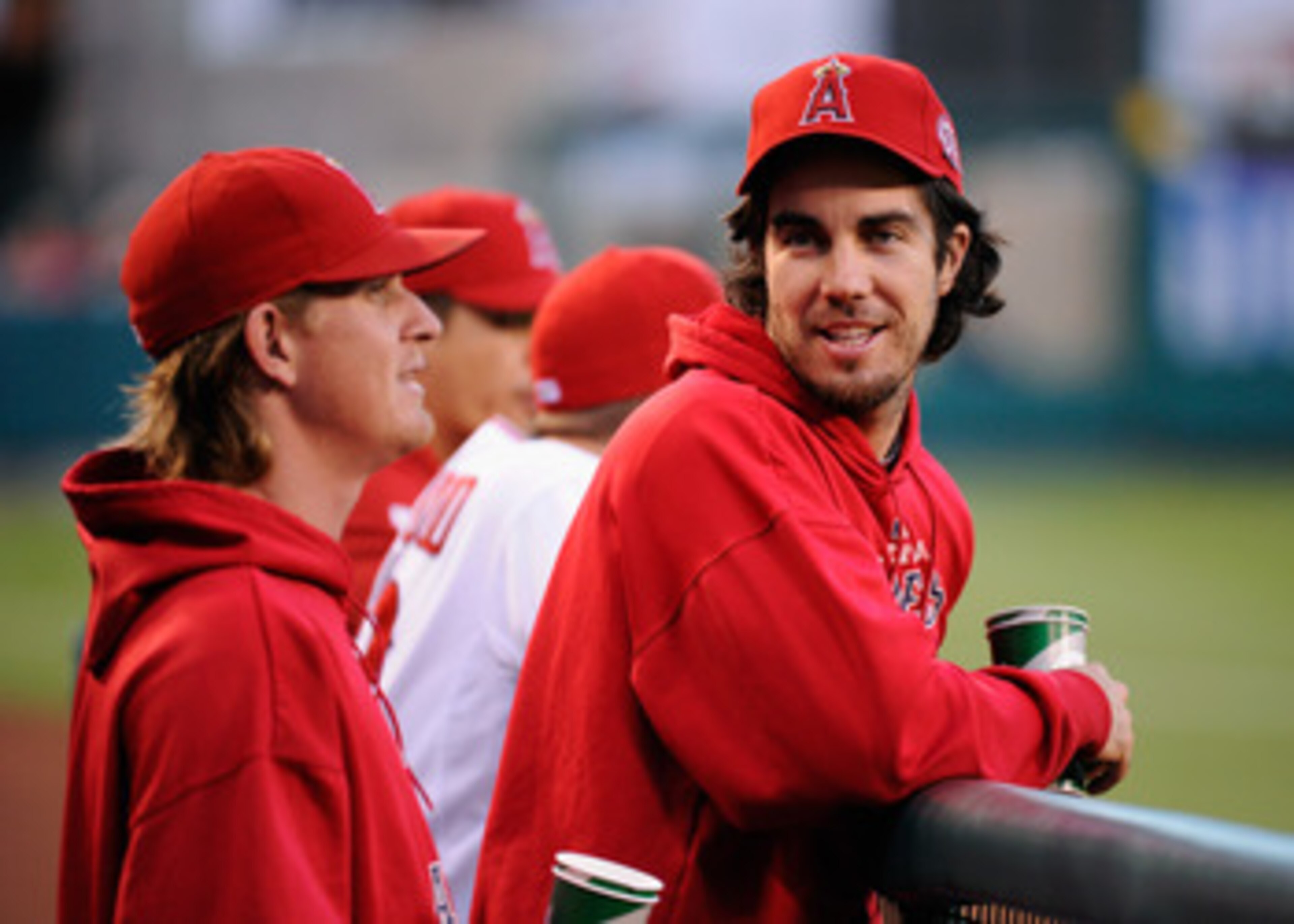 ANAHEIM, CA - MAY 25:  Pitchers Dan Harren #24 (R) and Jared Weaver #36 of the Los Angeles Angels of Anaheim during the baseball game against the Oakland Athletics at Angel Stadium of Anaheim on May 25, 2011 in Anaheim, California.  (Photo by Kevork Djans